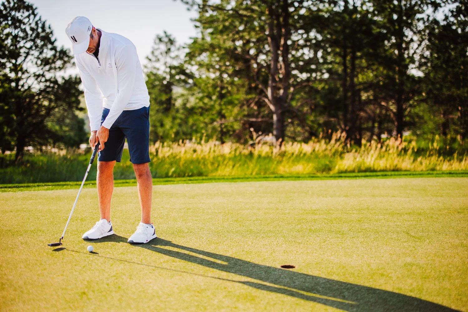 man putting on the north golf course