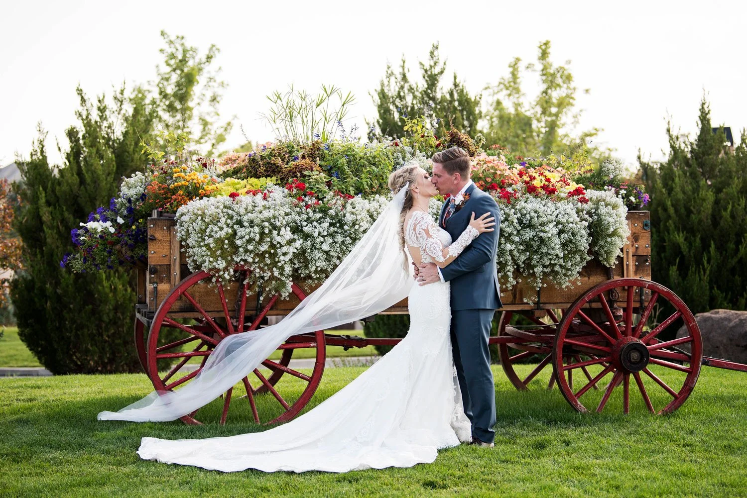 Fall wedding in colorado, wagon with flowers