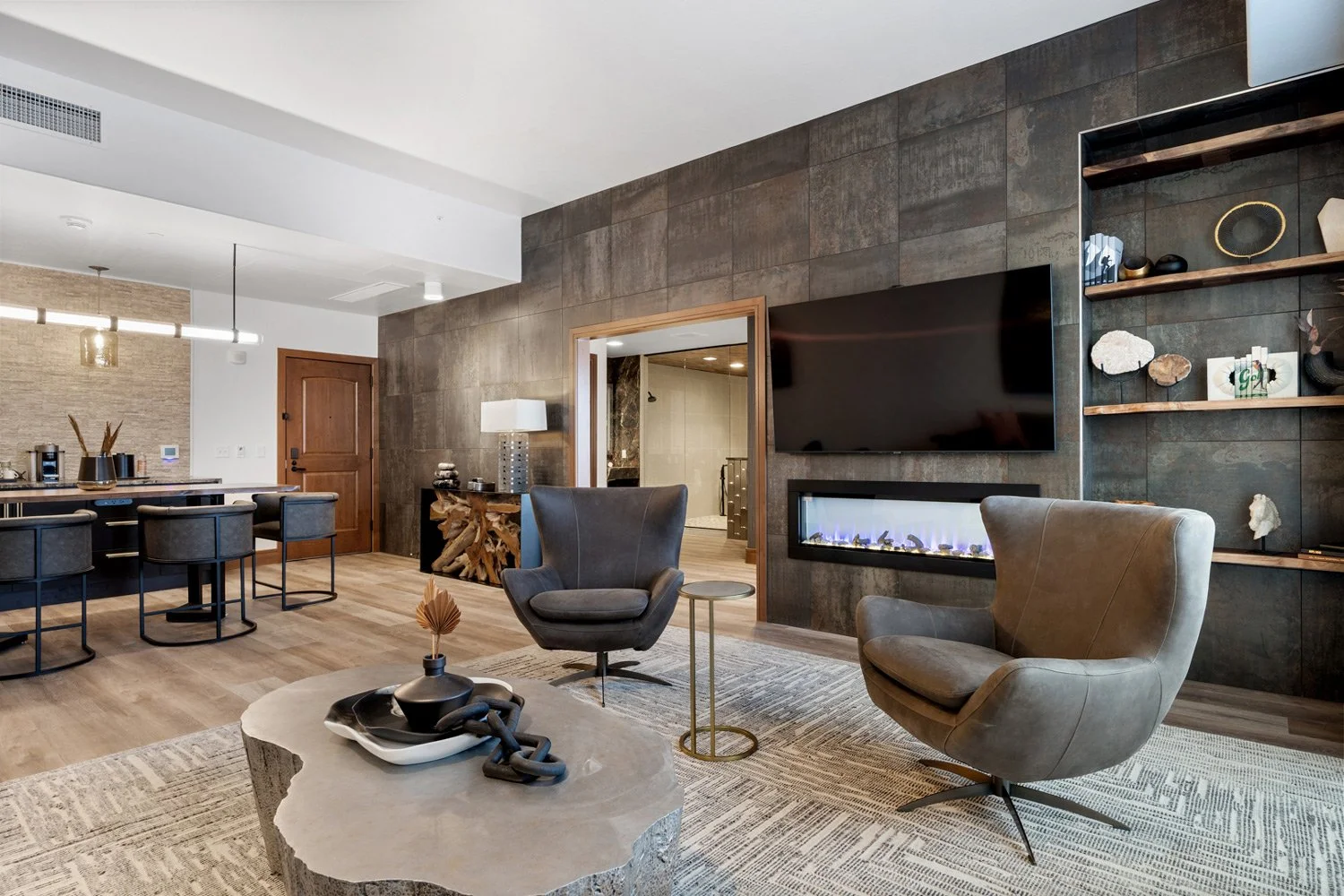 presidential suite sitting area and dining area with fireplace