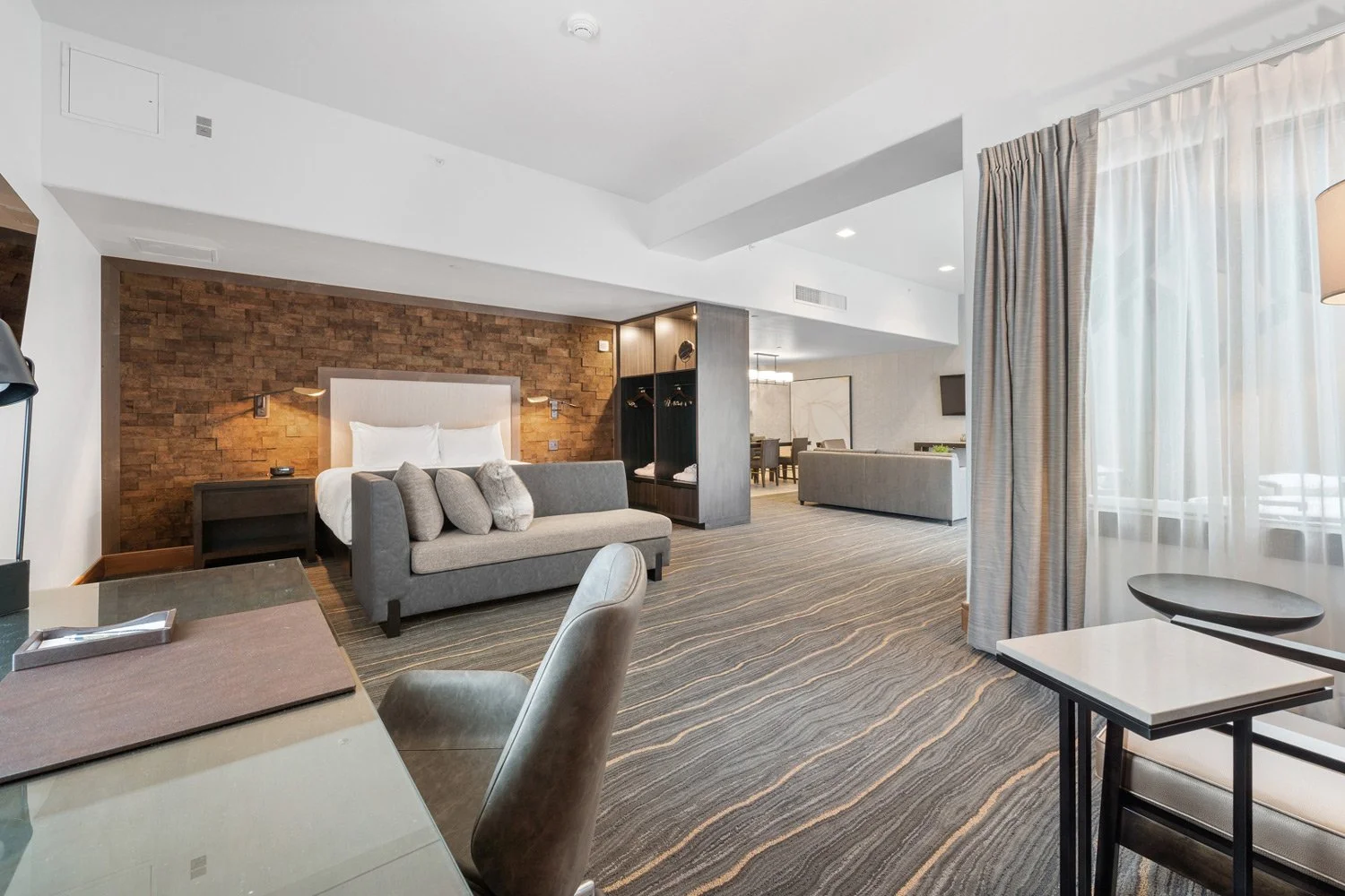 work station desk and bed in the executive suite