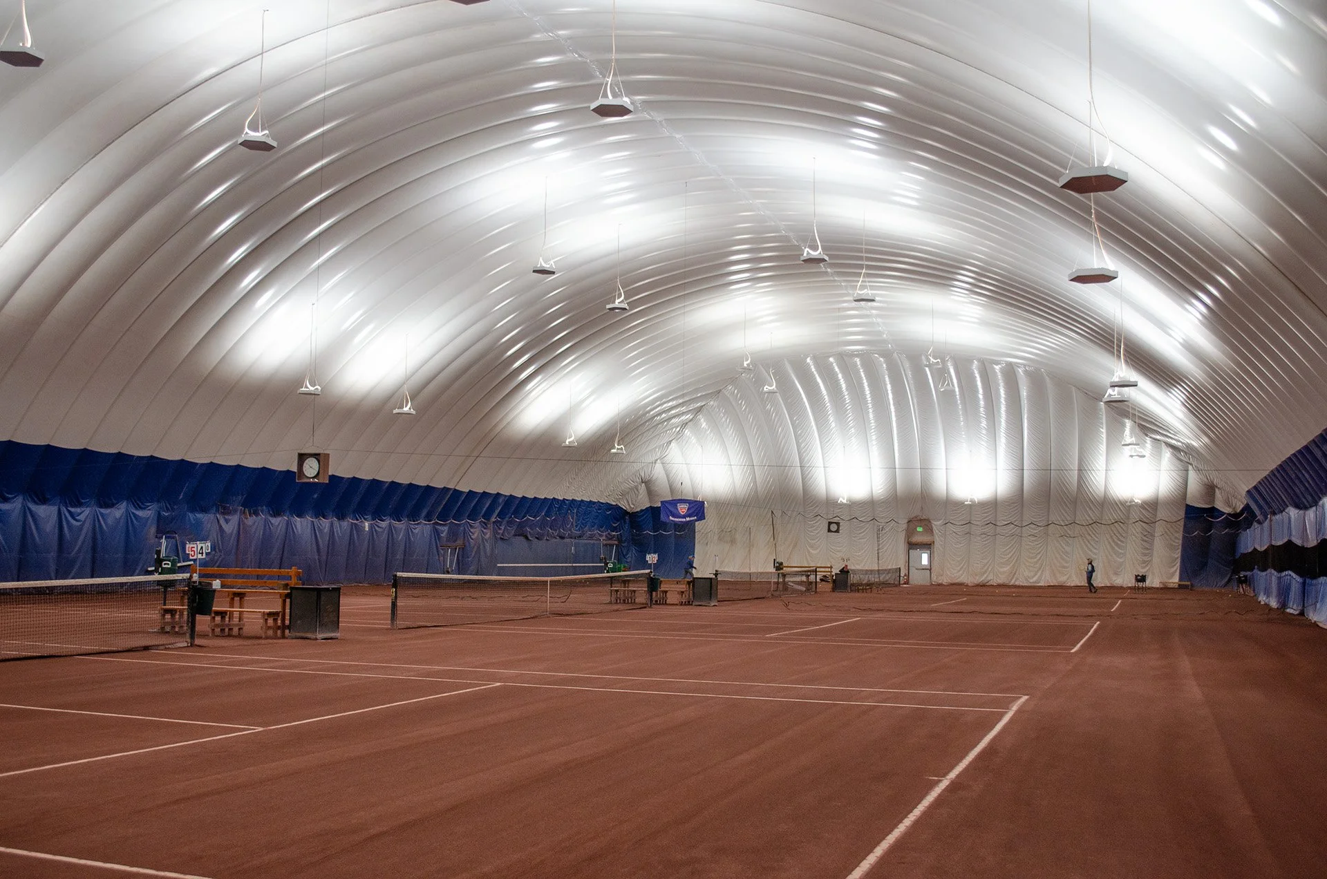 Covered red clay Tennis Courts