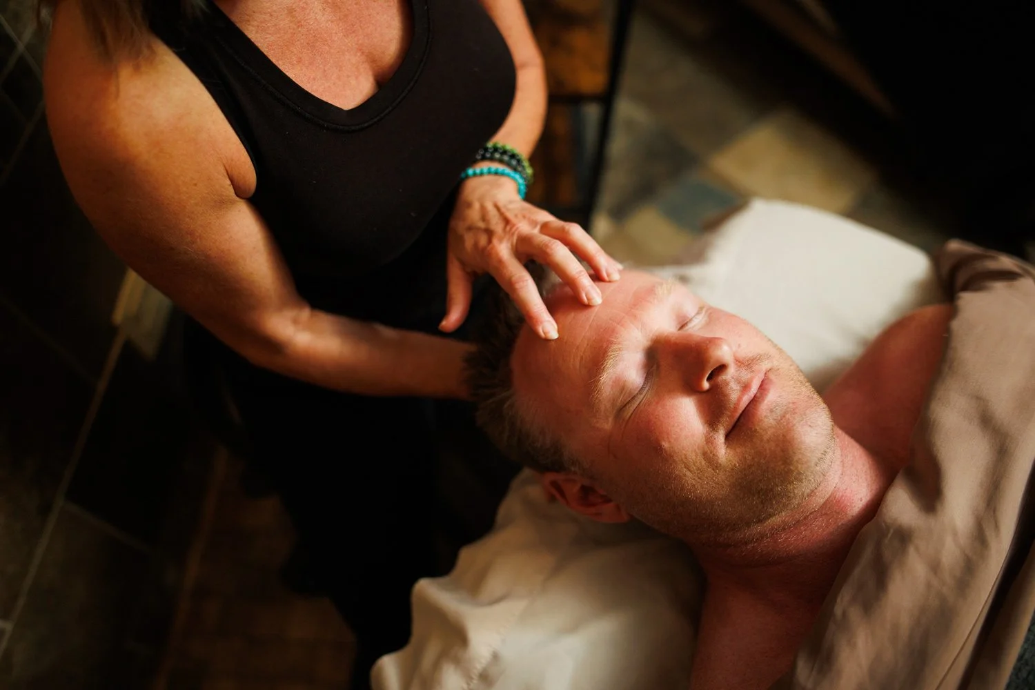 man receive a facial and massage
