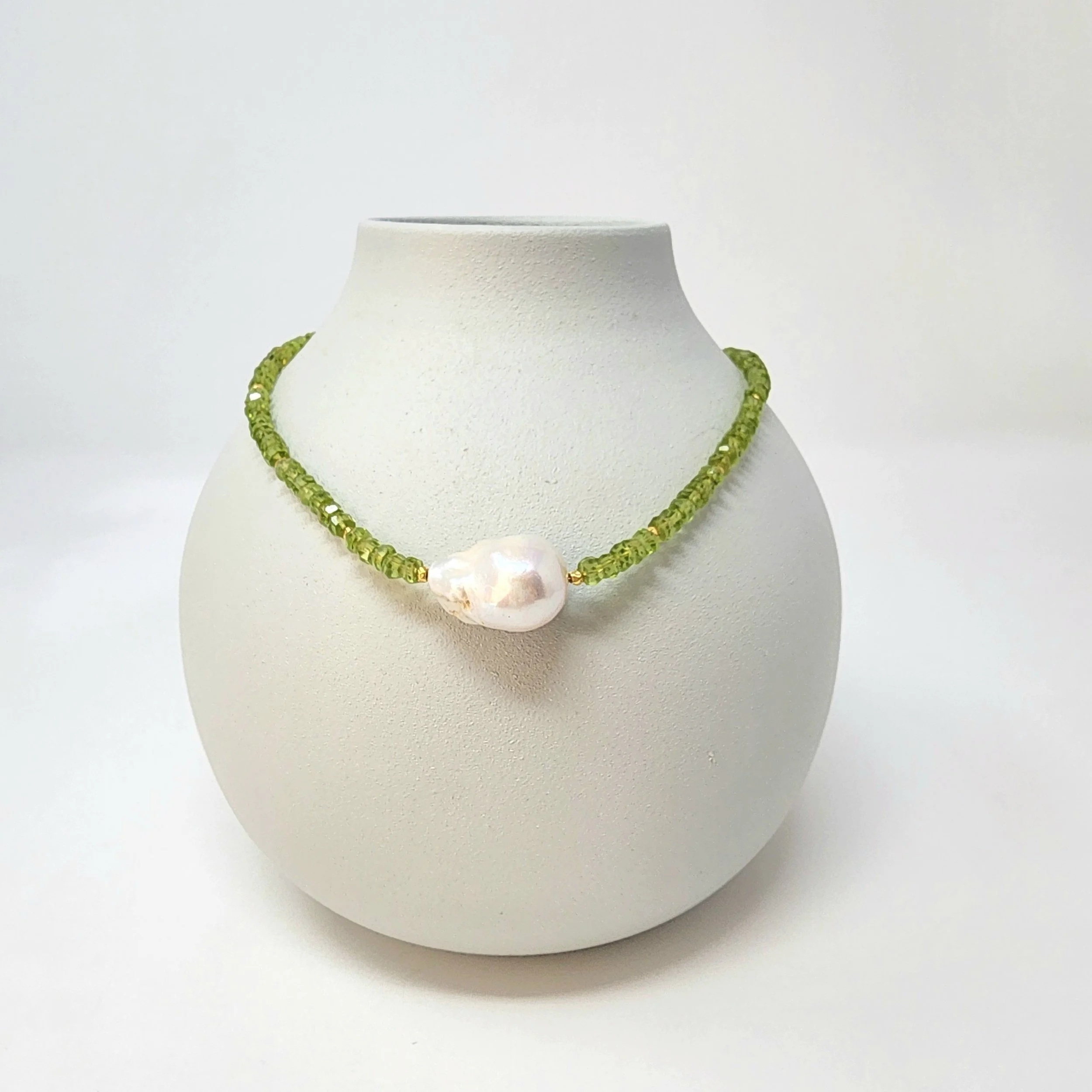 peridot-baroque-pearl-heart-chakra-necklace-16-inch.jpg peridot-august-birthstone-necklace-with-pearl-center.jpg handmade-gemstone-necklace-peridot-and-pearl-16-inch.jpg