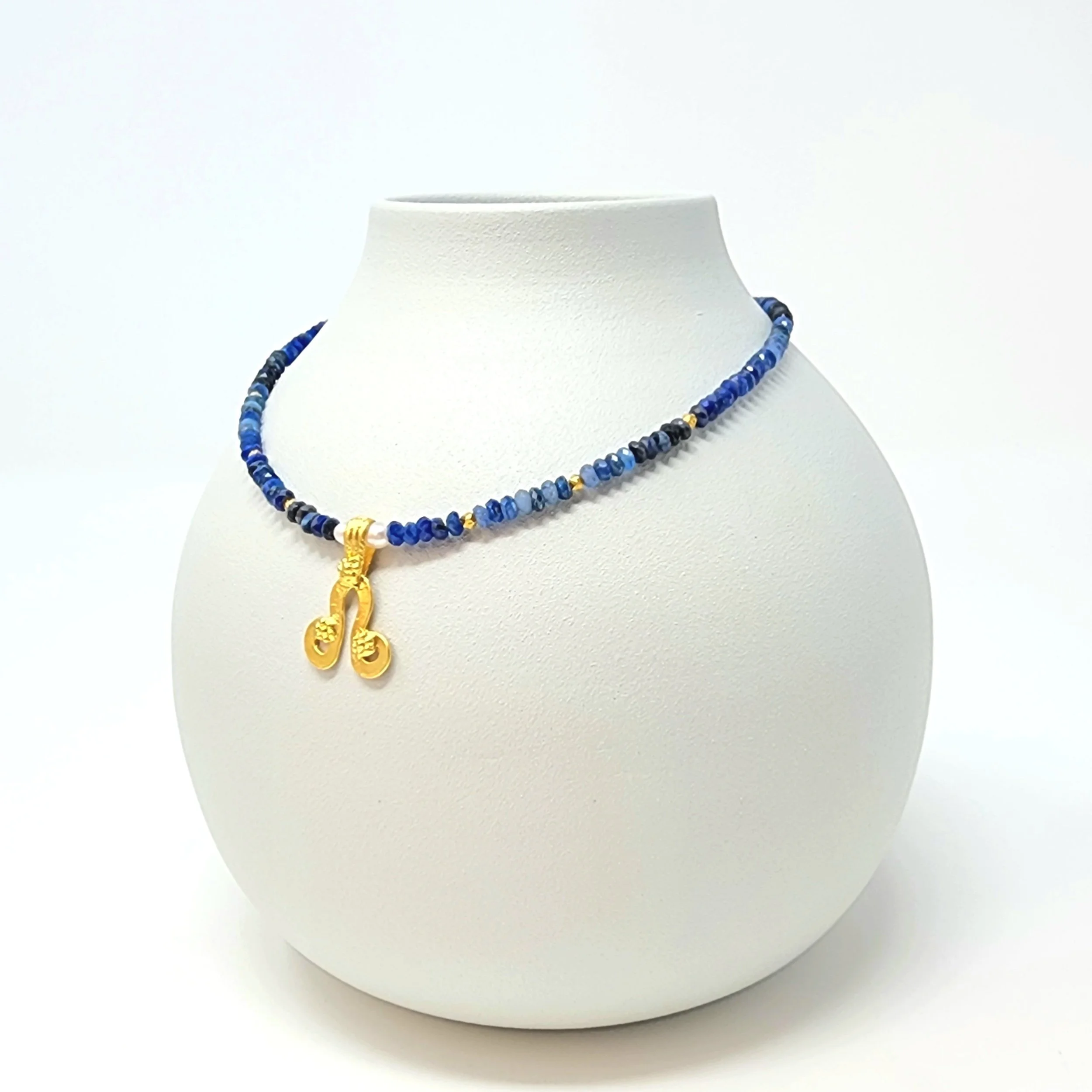 kyanite-blue-gemstone-necklace-gold-pendant.jpg