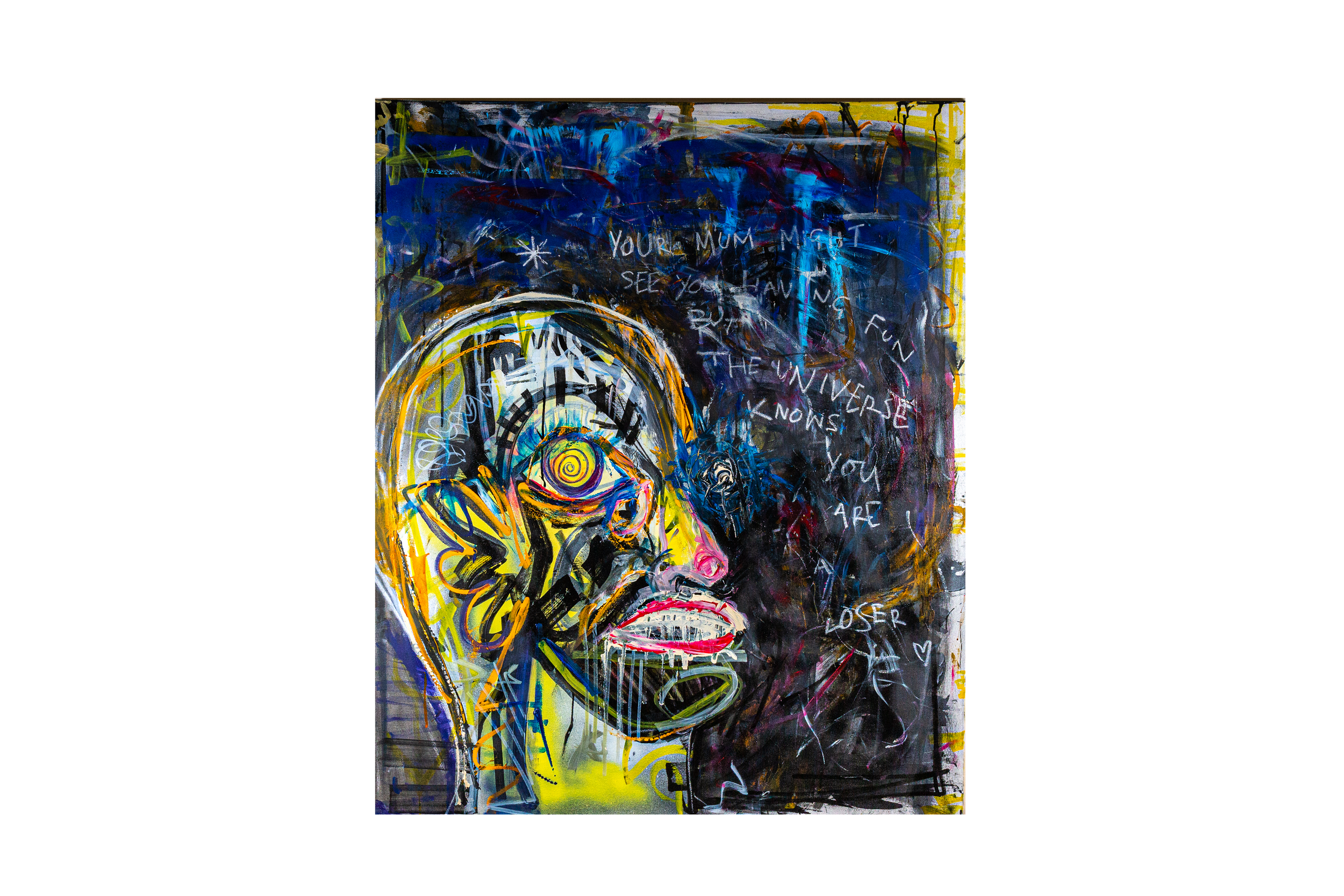 Abstract street art painting of a human face with vibrant colors and expressive brushstrokes, featuring handwritten text in the background.