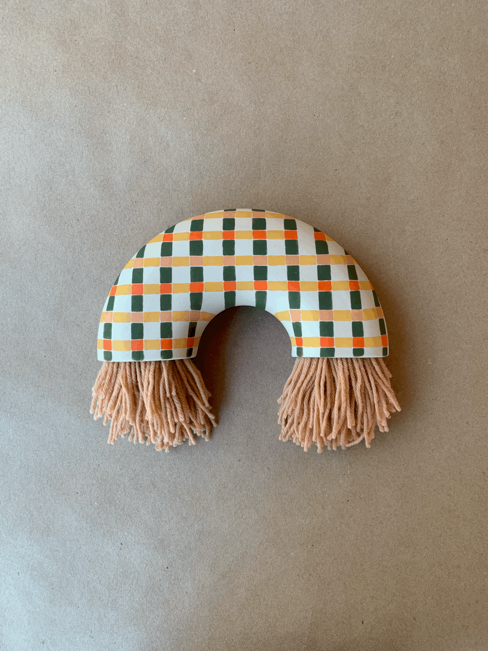 Handmade checkered ceramic arch wall hanging with fringe by Ware Ware Studio