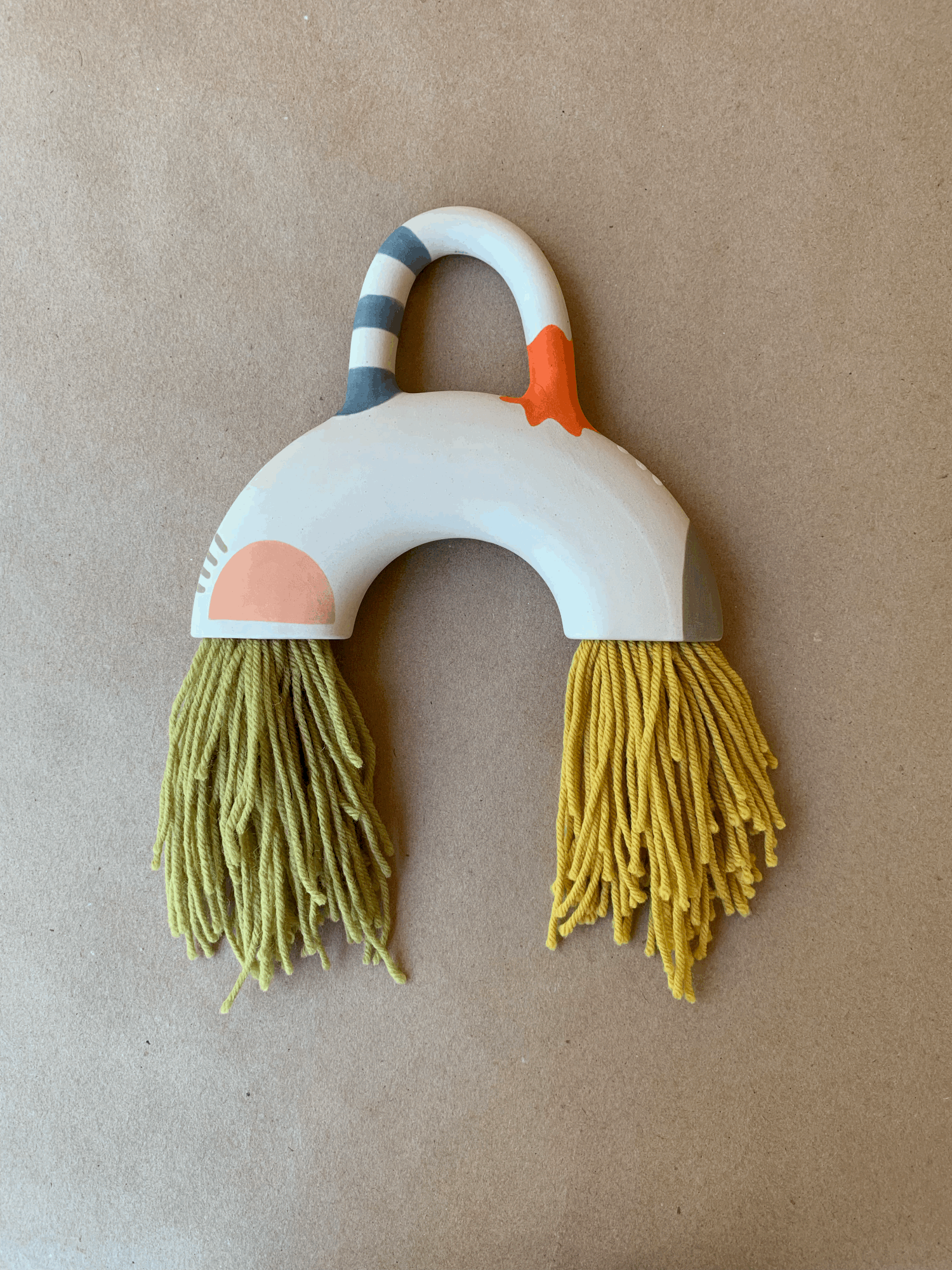 Abstract Color Block wall sculpture with a peach arch and mustard fringe