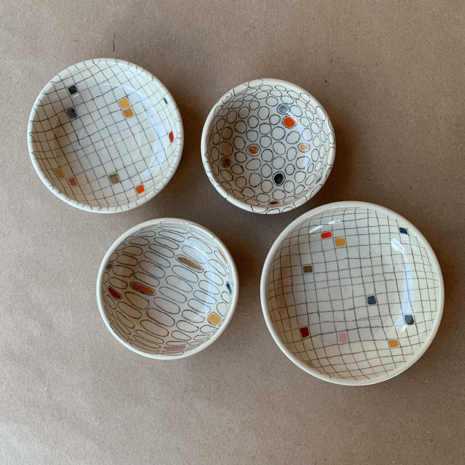 Line Work Bowls, set of four bowls with hand-painted line and grid patterns