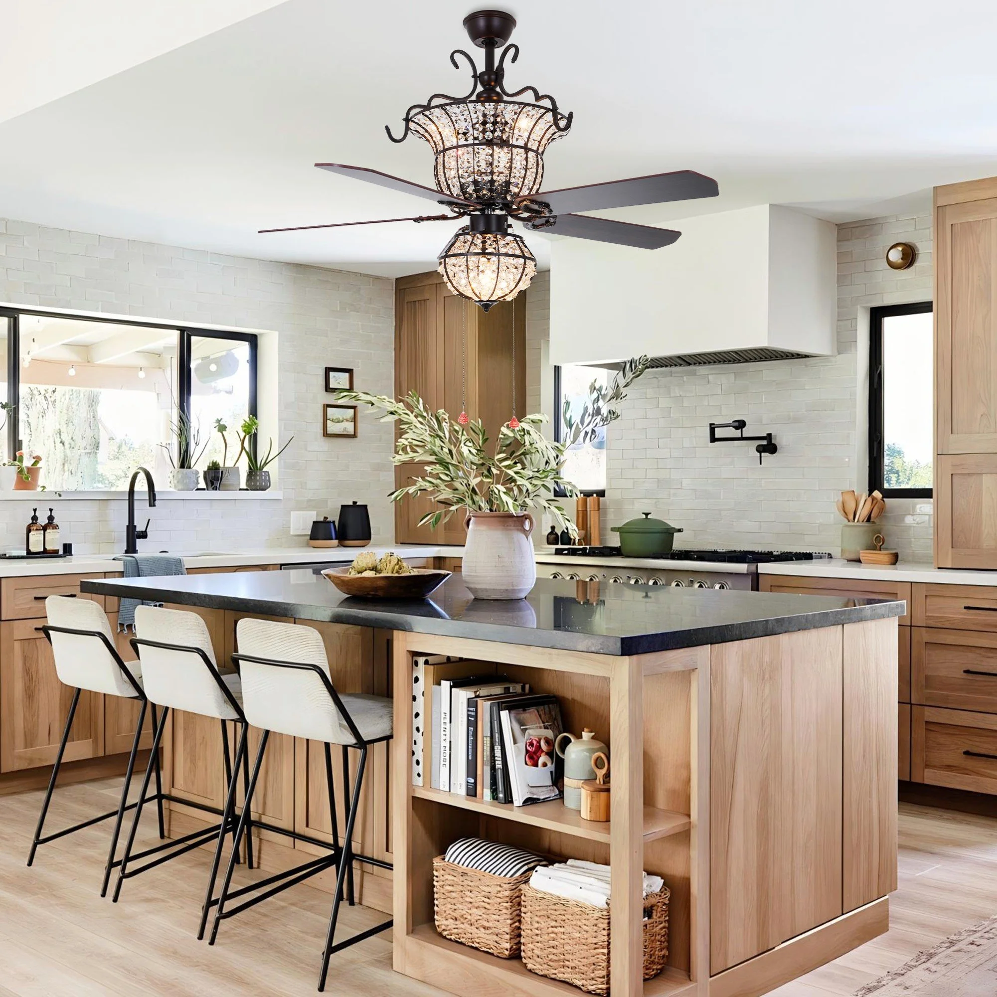 52-inch crystal chandelier ceiling fan installed above a large farmhouse kitchen island with bar stools