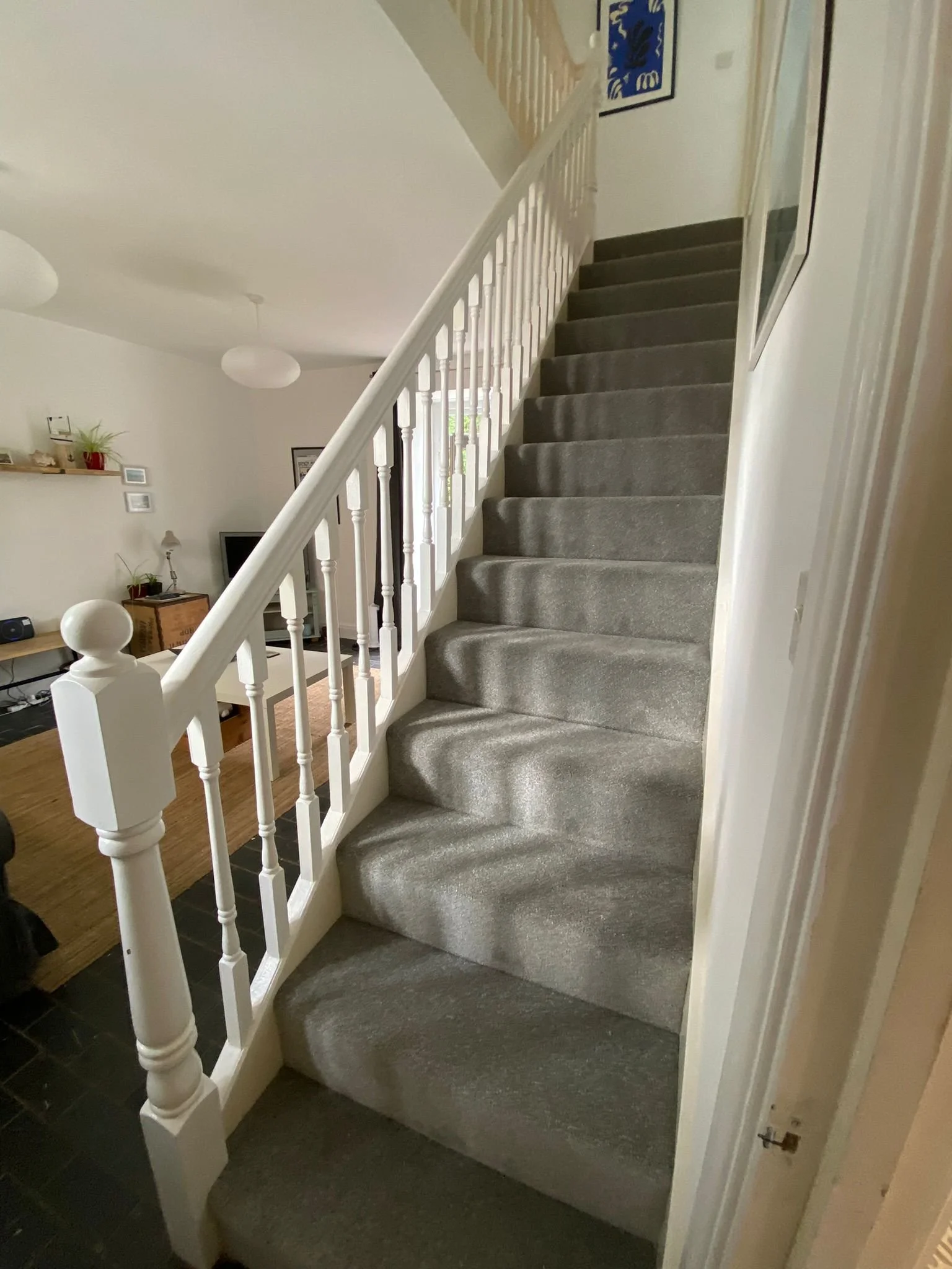 New painted staircase with new carpet