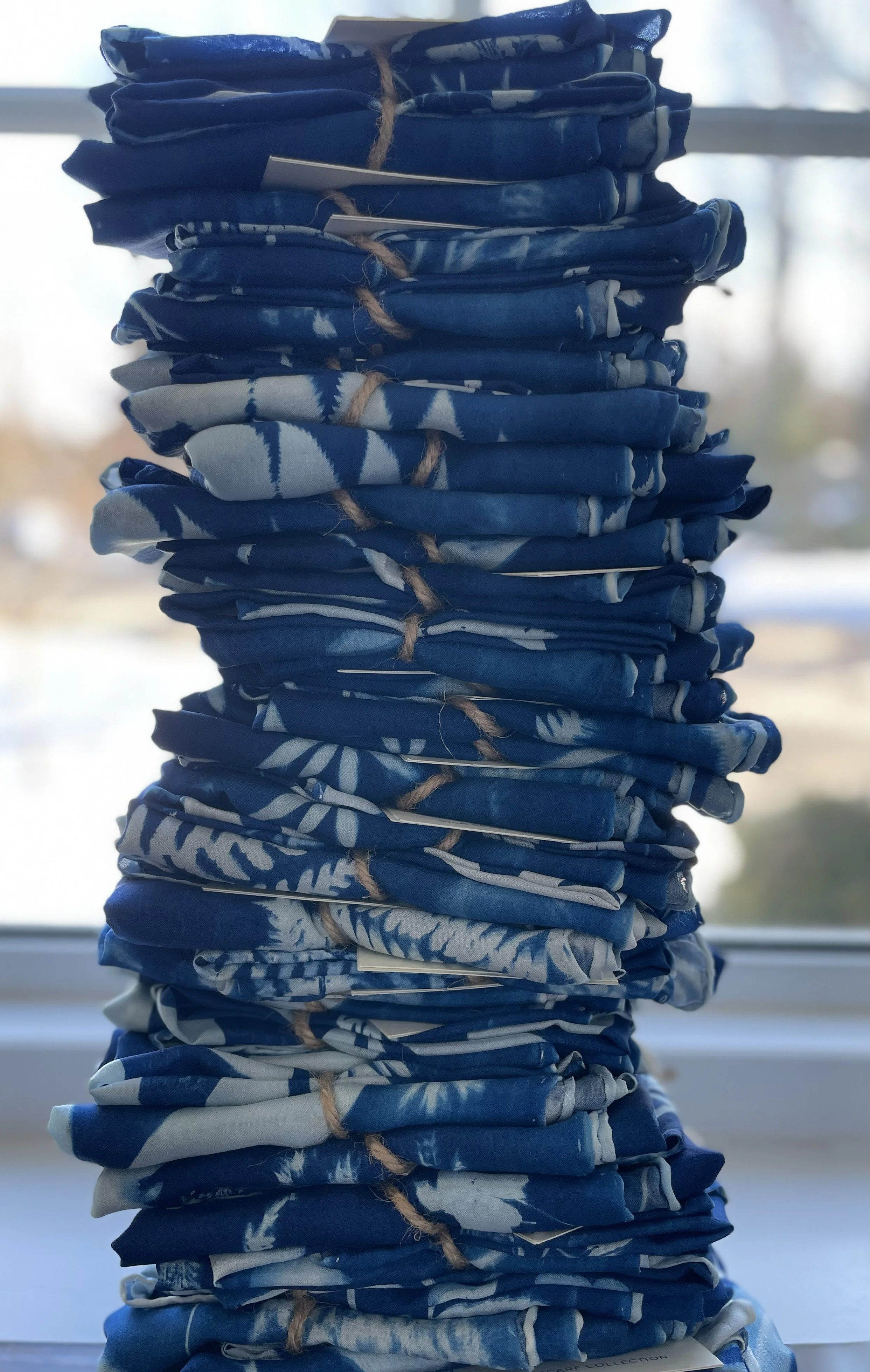 Commissions - Piles of blue and white cyanotype silk scarves