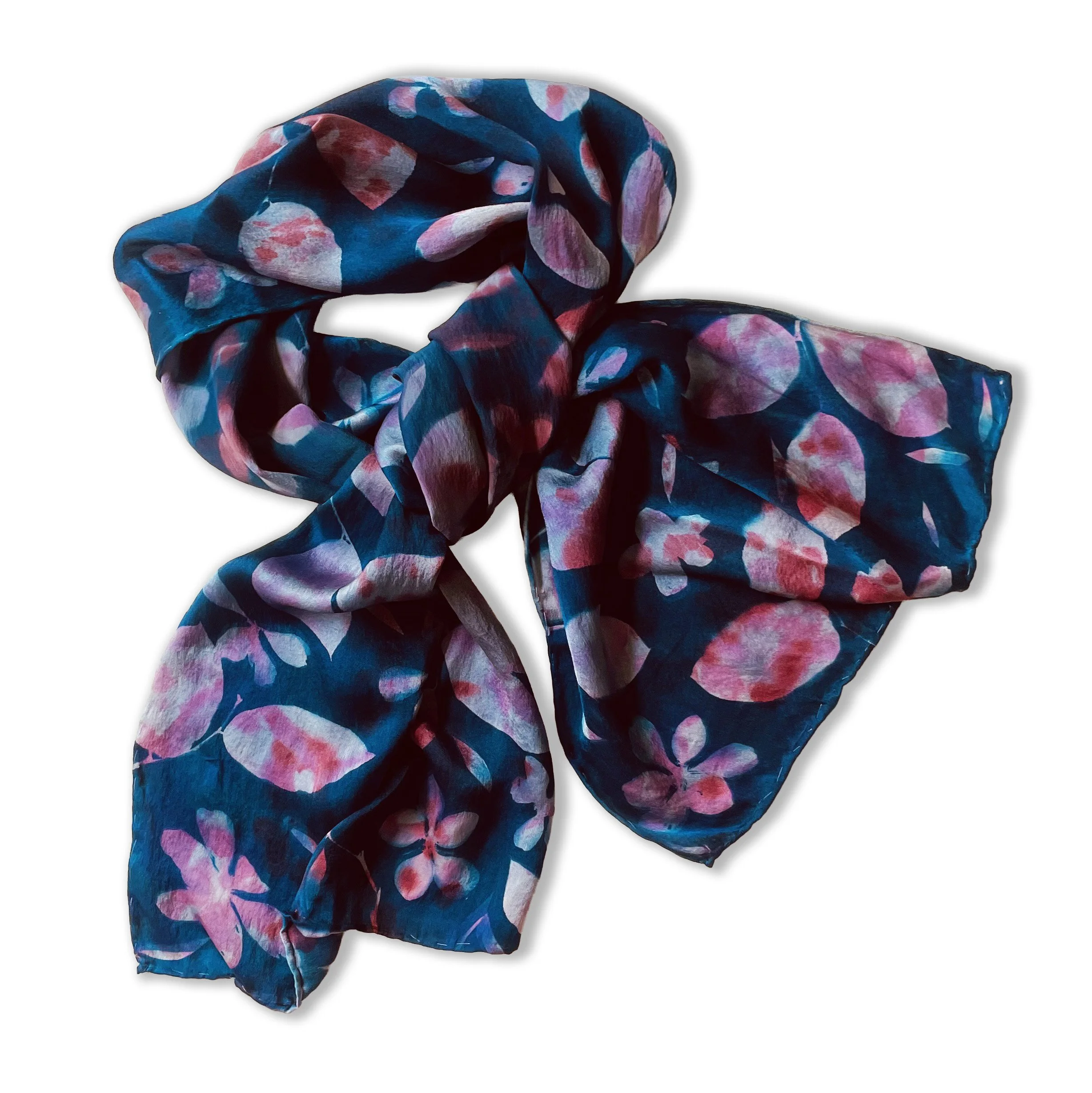 One of the kind cyanotype colorful floral silk scarf with pink, purple, and white flowers on a dark blue background.