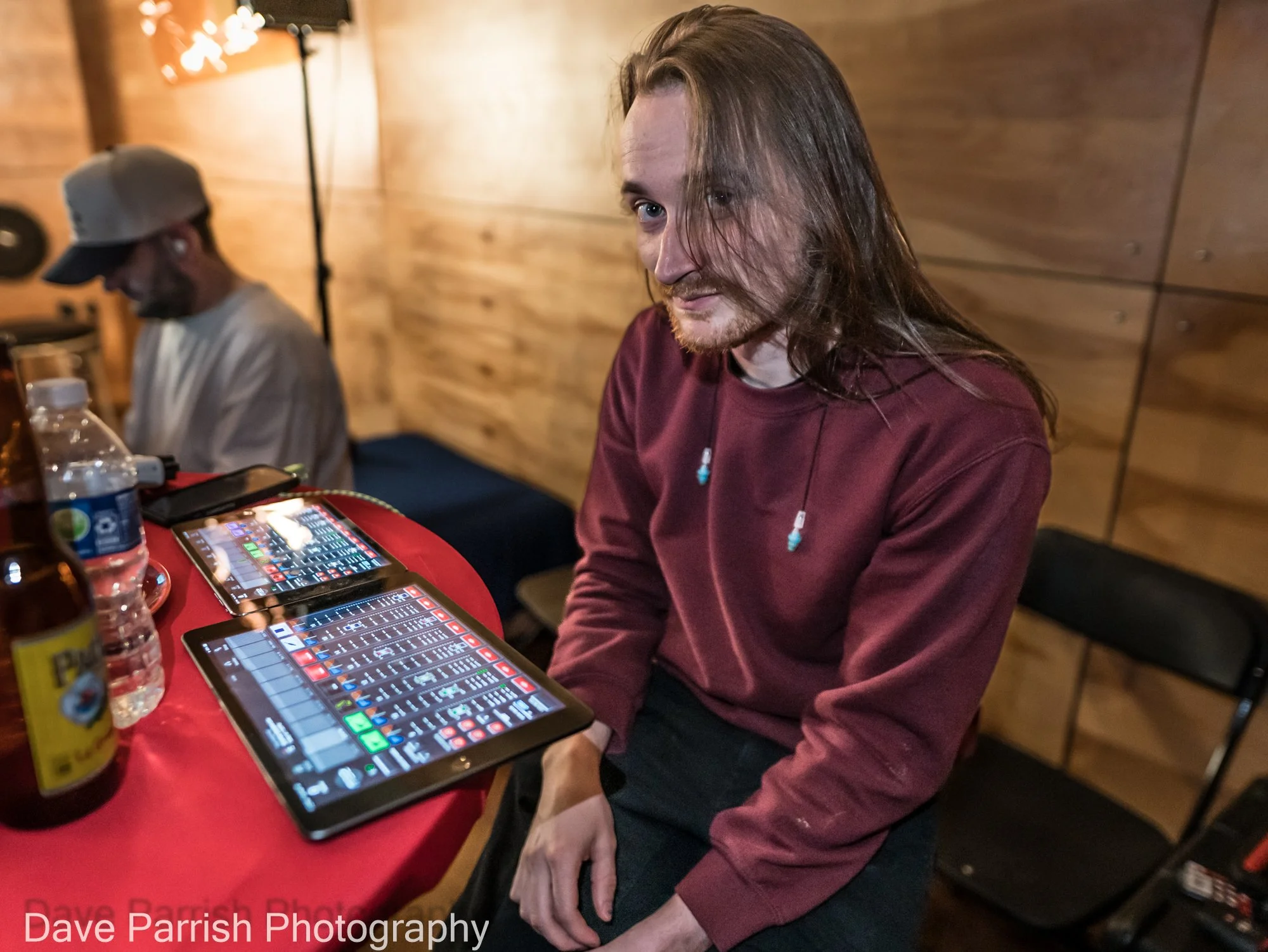 A man mixing music on an iPad.