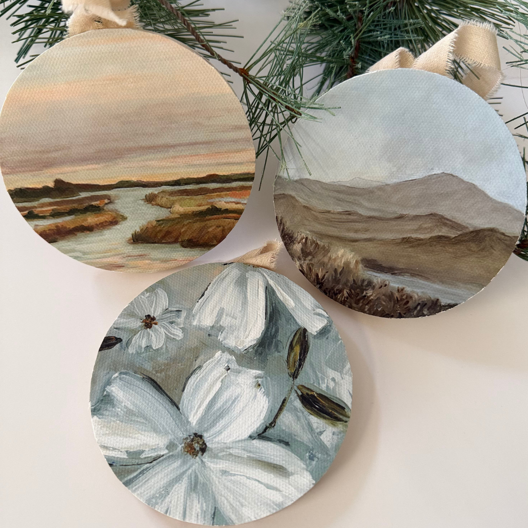 Mountain to the sea ornaments on table.png