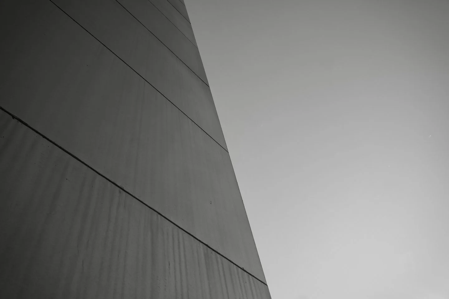 A few snapshots from a summer adventure to the Gateway Arch.

Occasionally, I will explore my surroundings through monochrome photography. As the afternoon sun shone, it revealed the elegance of the design and craftsmanship. The monument's triangular