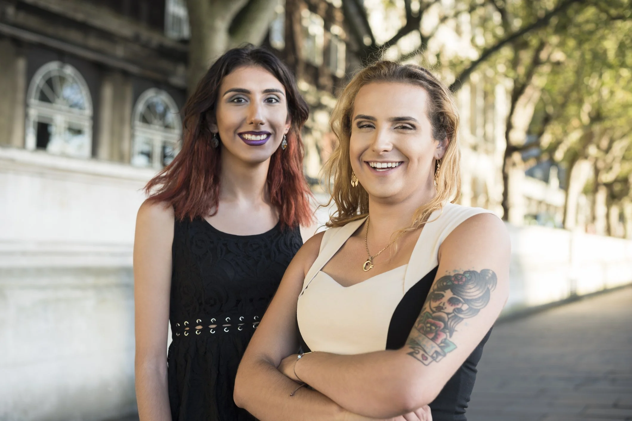 two trans gender people smiling