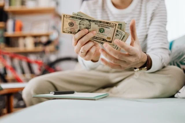 A person counting money