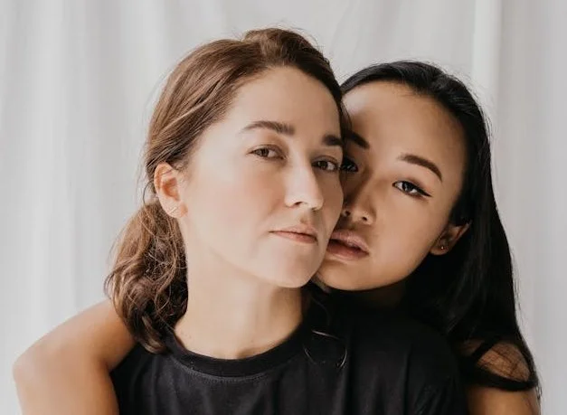 A couple smiling and hugging