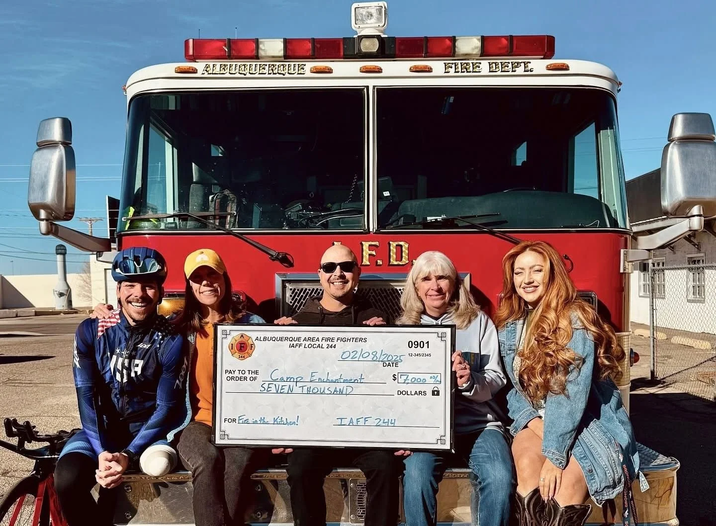 Camp Enchantment Board presented a donation by the Albuquerque Area Fire Fighters