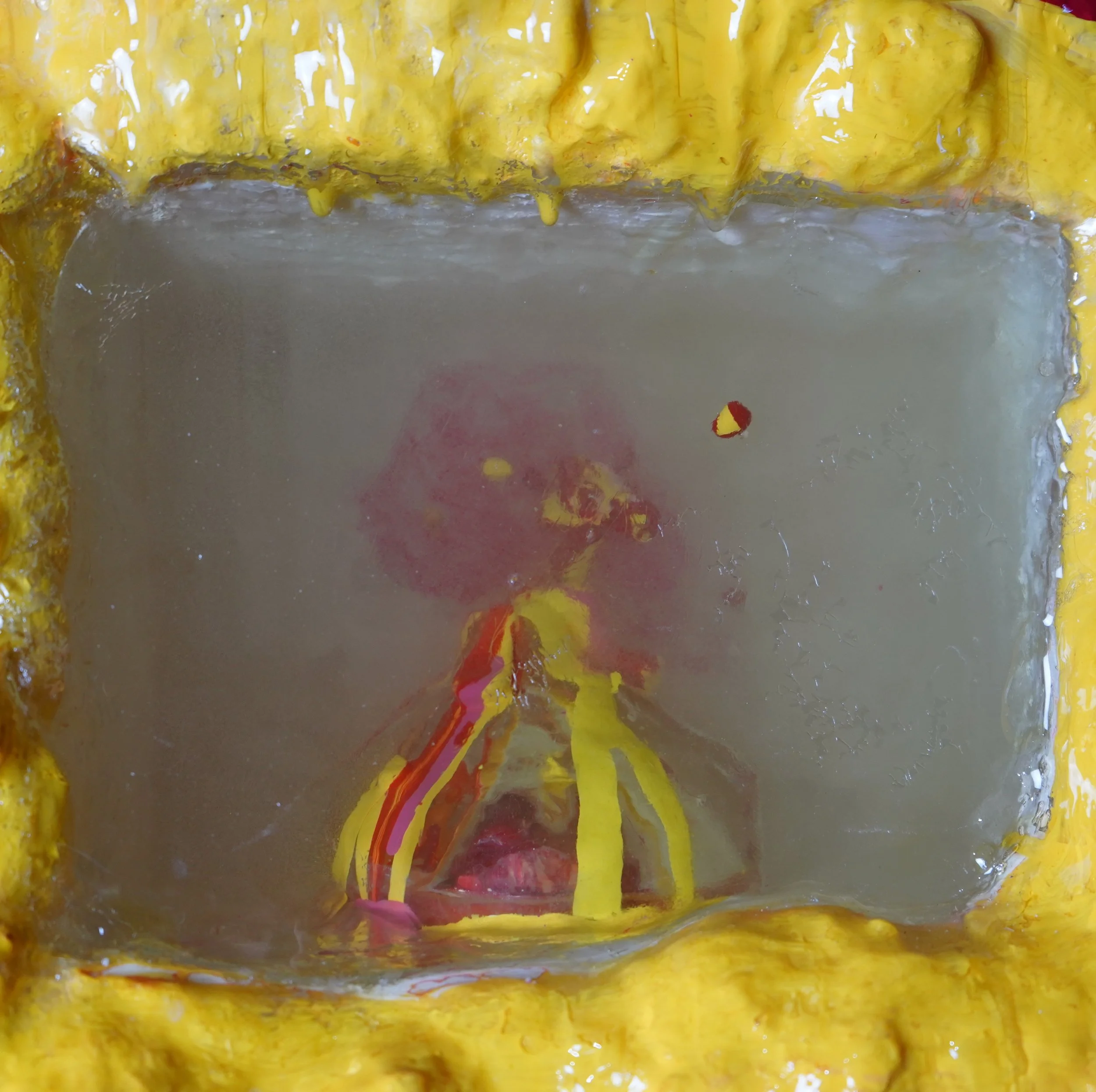 Detail view of Volcanic Shelf sculpture by contemporary artist Sophia Huang, mixed media shelf sculpture with resin, paint, and embedded objects, abstract melting form