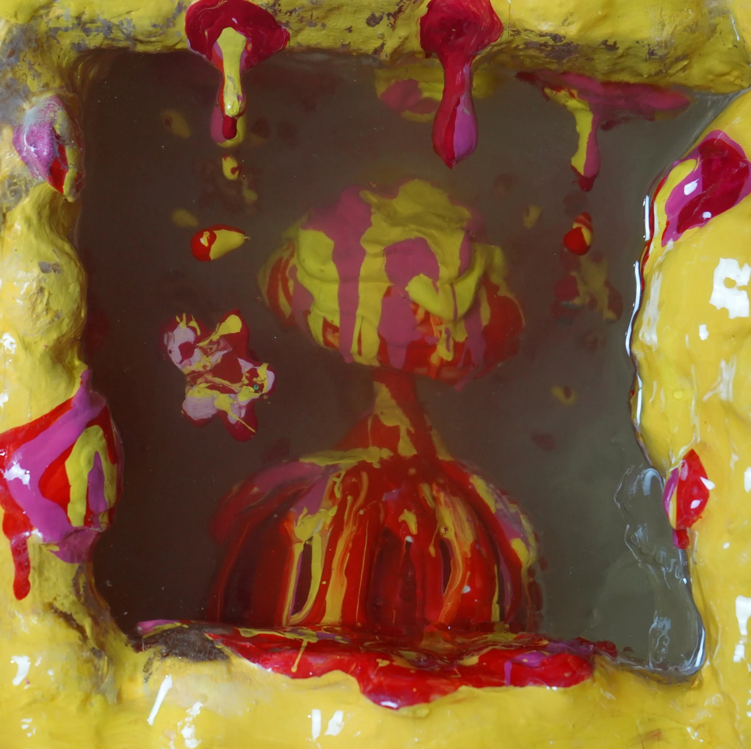 Detail view of Volcanic Shelf sculpture by contemporary artist Sophia Huang, mixed media shelf sculpture with resin, paint, and embedded objects, abstract melting form