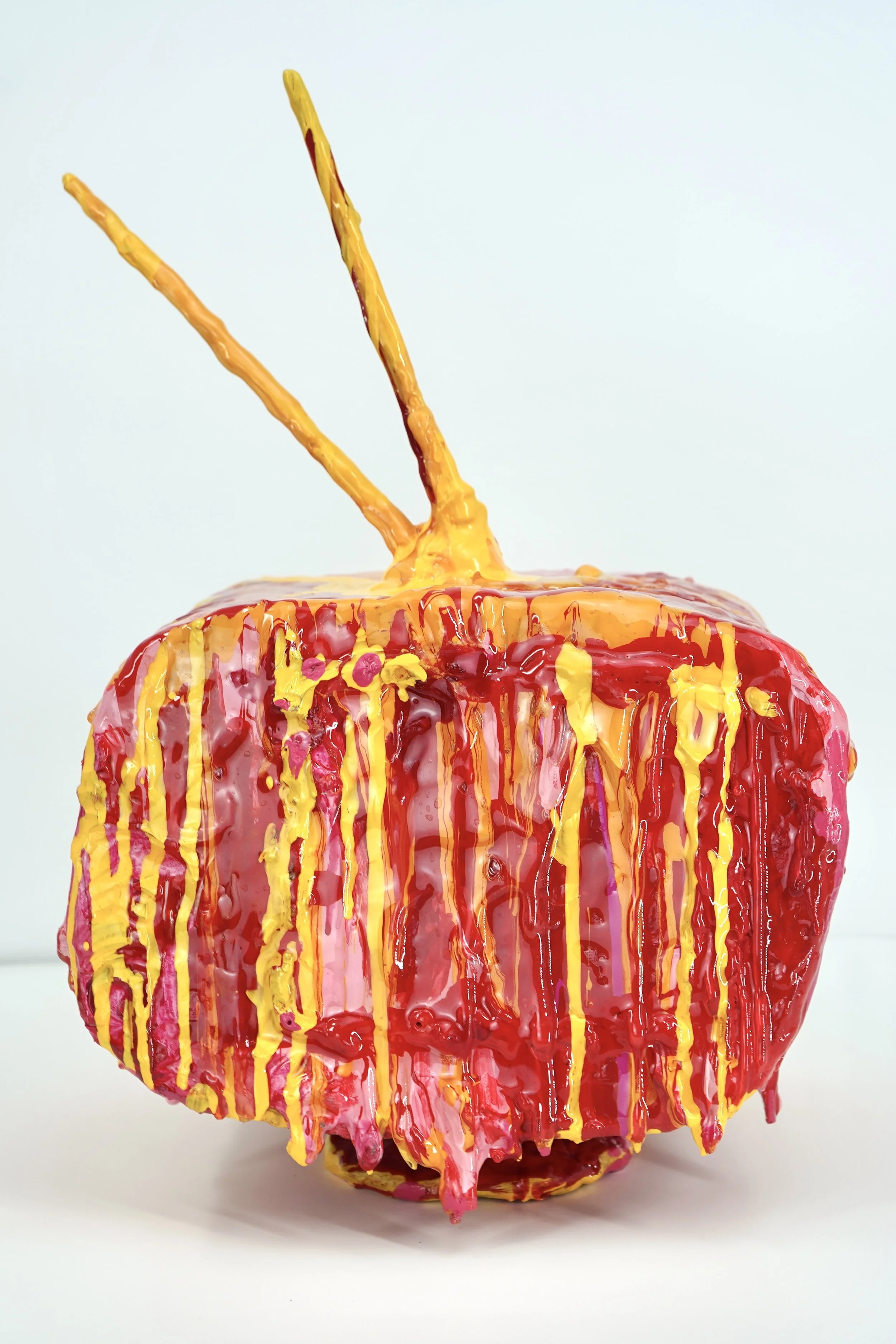 Back view of melting television sculpture by contemporary artist Sophia Huang, mixed media sculpture with resin, paint, and embedded lenticular print, abstract TV form