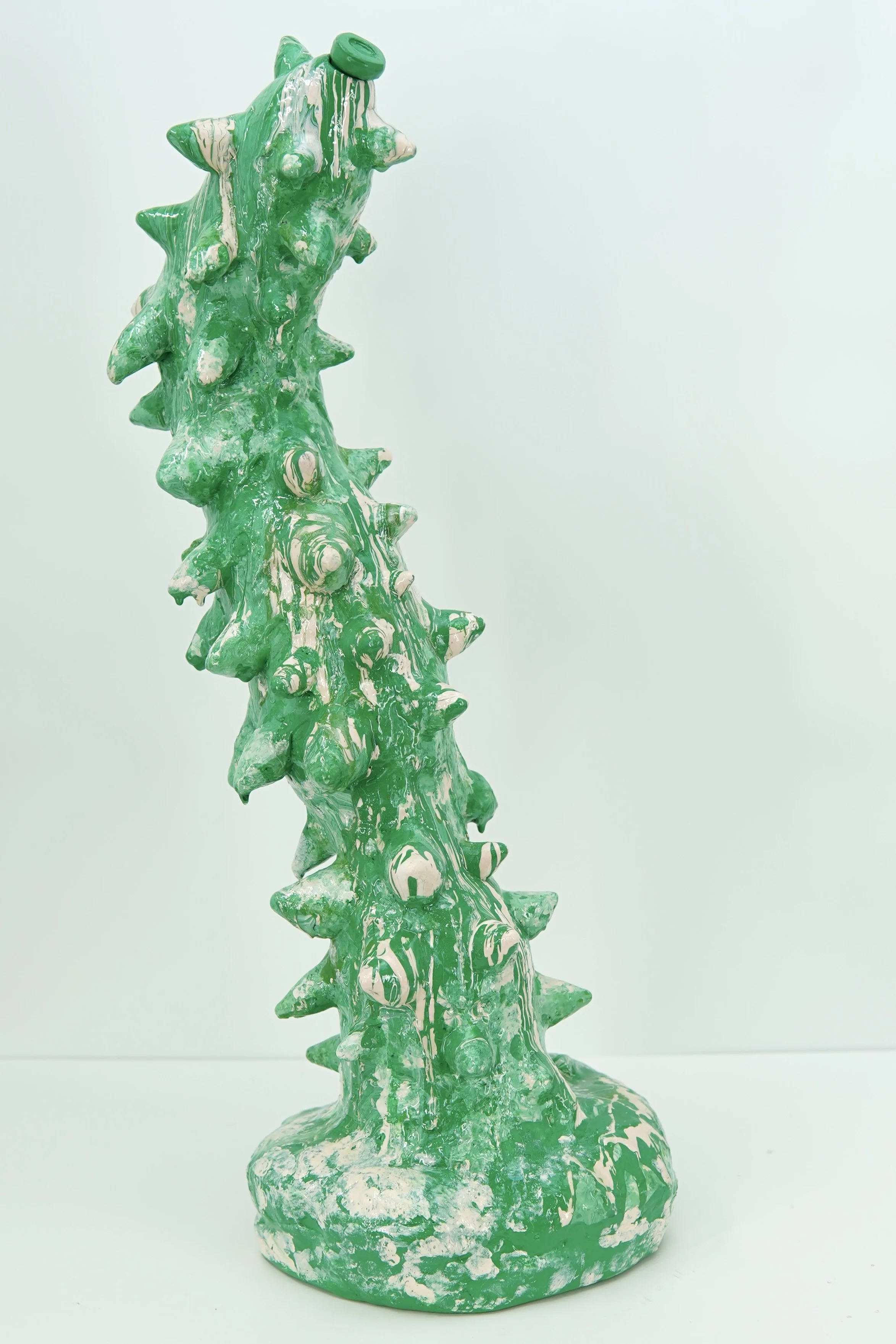 In Ash Banquet, artist Sophia Huang creates abstract resin and clay foam vessels containing the ashes of burned letters to past lovers and former selves, transforming grief into a ritual of containment, closure, and release.