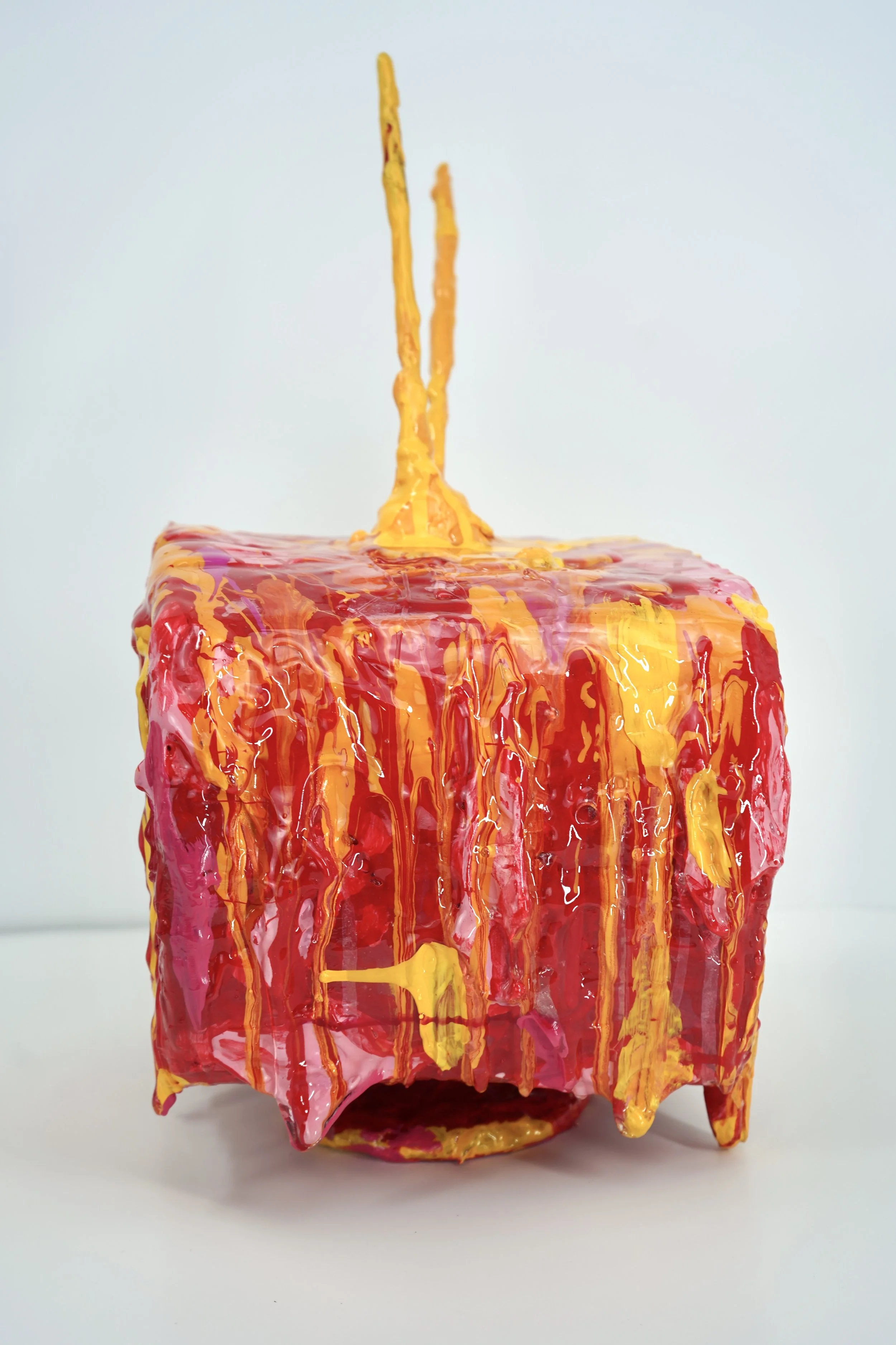 Side view of melting television sculpture by contemporary artist Sophia Huang, mixed media sculpture with resin, paint, and embedded lenticular print, abstract TV form