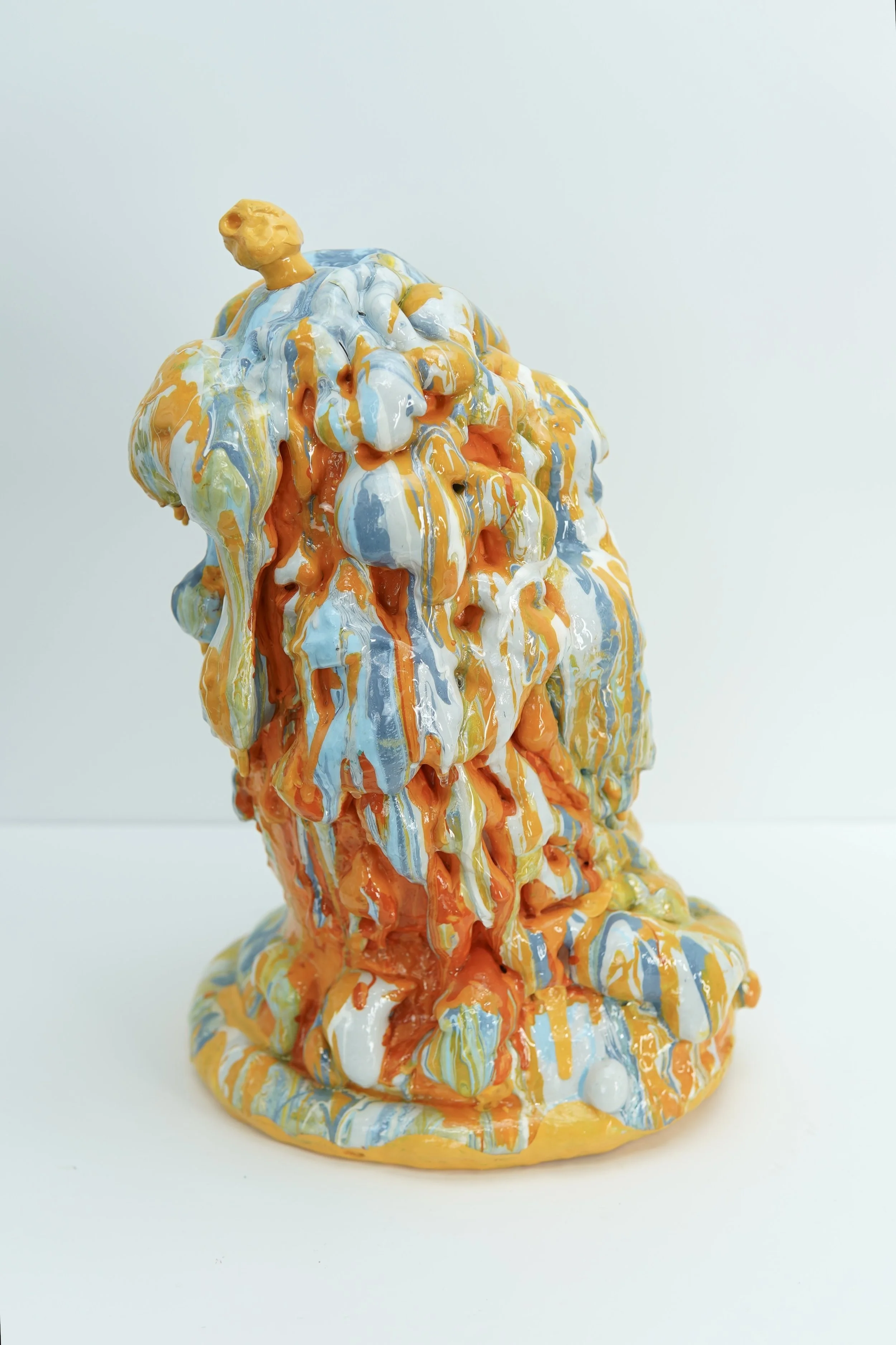In Ash Banquet, artist Sophia Huang creates abstract resin and clay foam vessels containing the ashes of burned letters to past lovers and former selves, transforming grief into a ritual of containment, closure, and release.