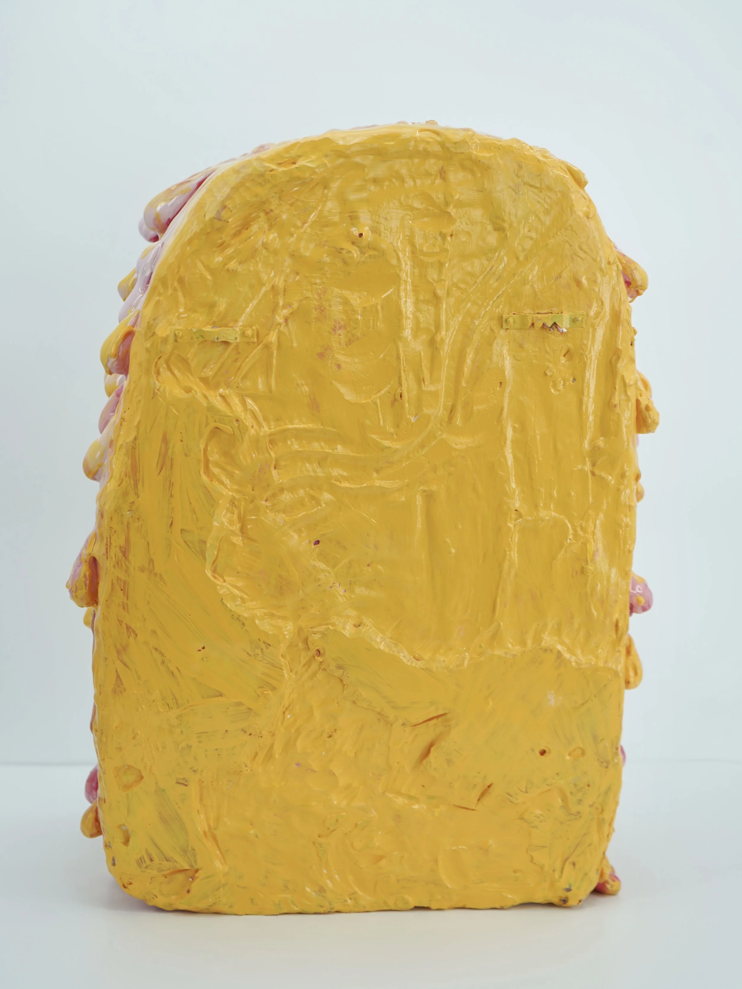 Back view of melting medicine cabinet sculpture by contemporary artist Sophia Huang, mixed media sculpture with resin, paint, and embedded pill capsules