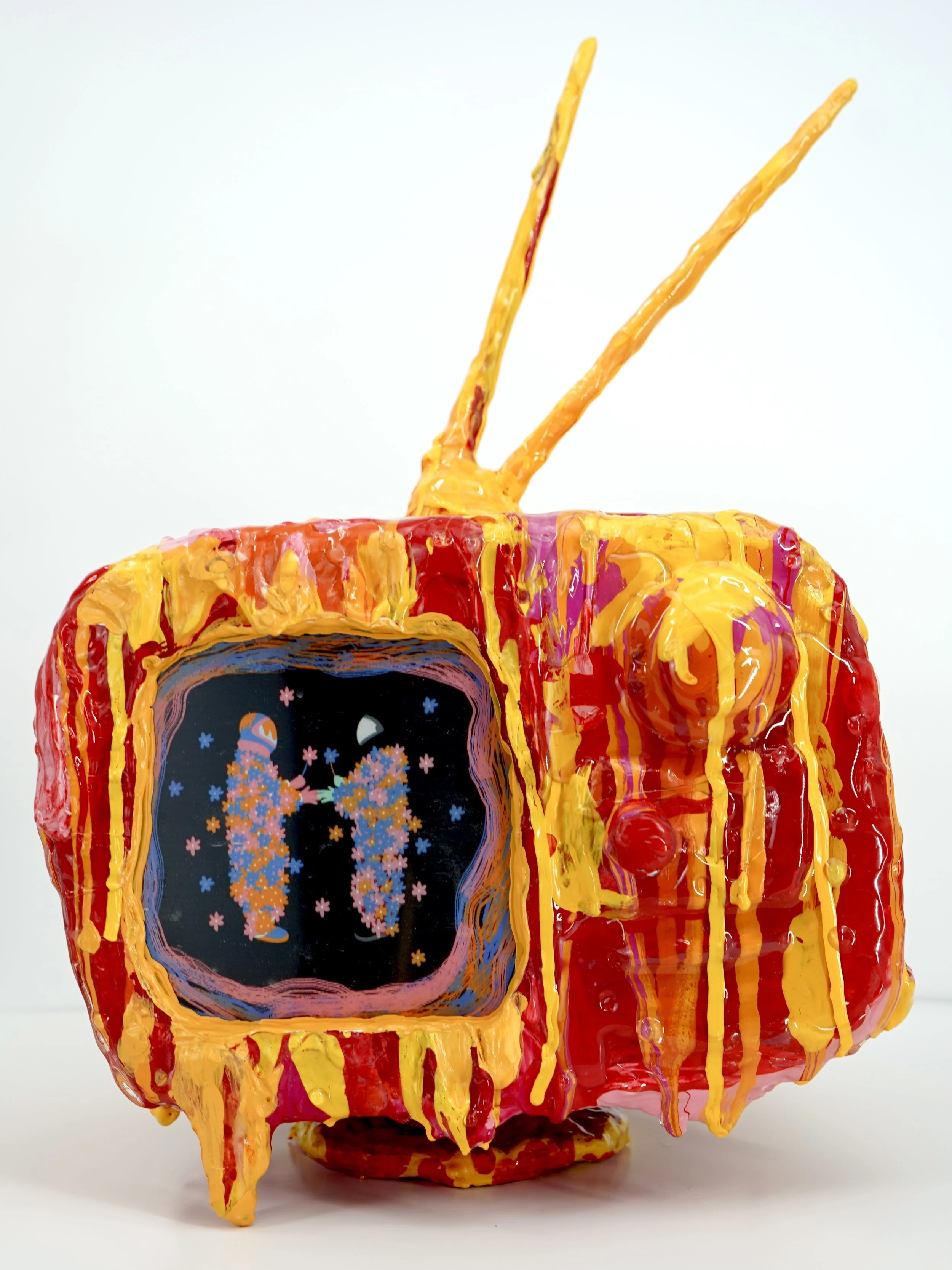 Front view of melting television sculpture by contemporary artist Sophia Huang, mixed media sculpture with resin, paint, and embedded lenticular print, abstract TV form
