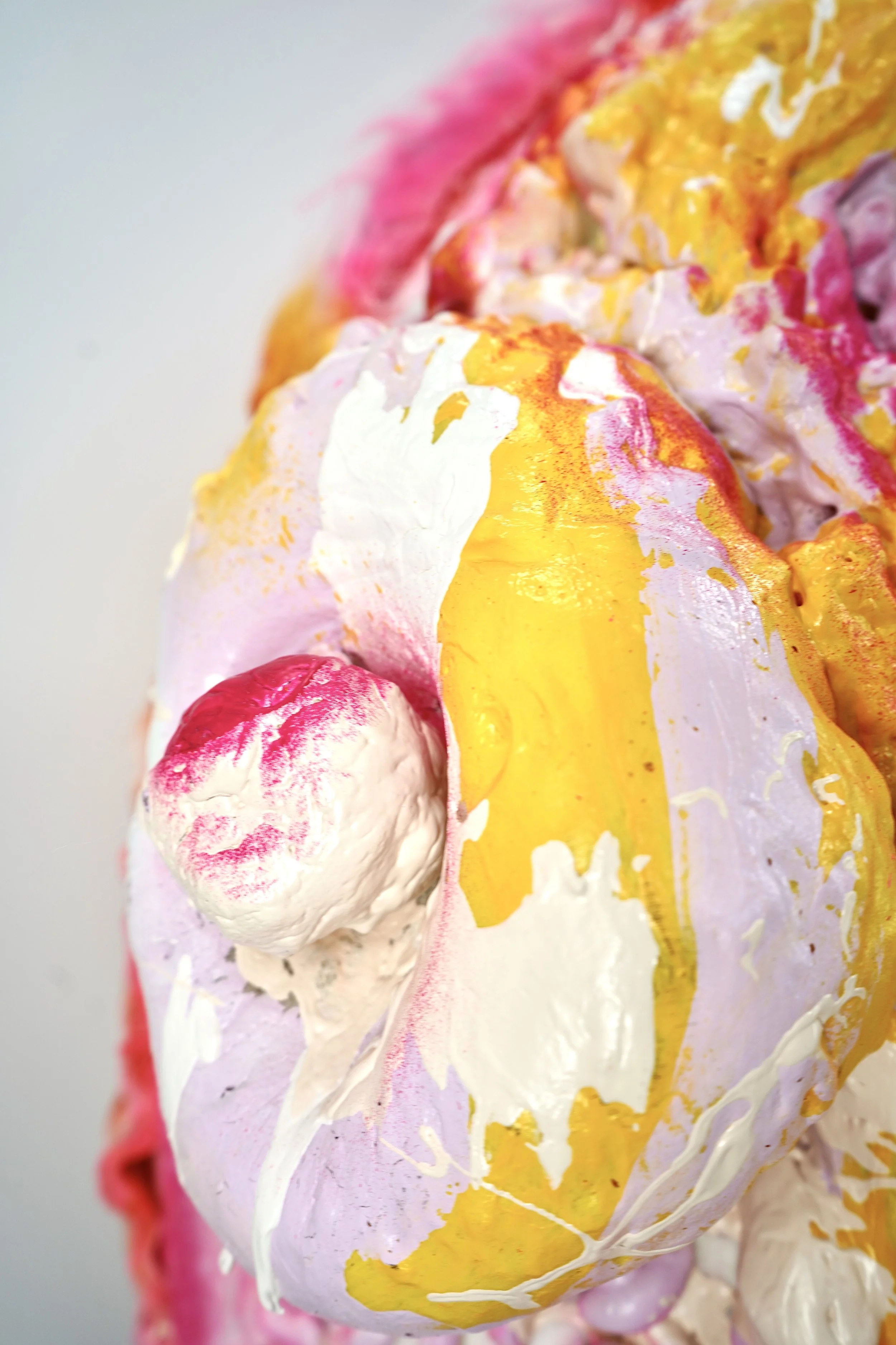 Detail view of The Recovering People Pleaser sculpture by contemporary artist Sophia Huang, mixed media sculpture featuring iridescent mixed media elements