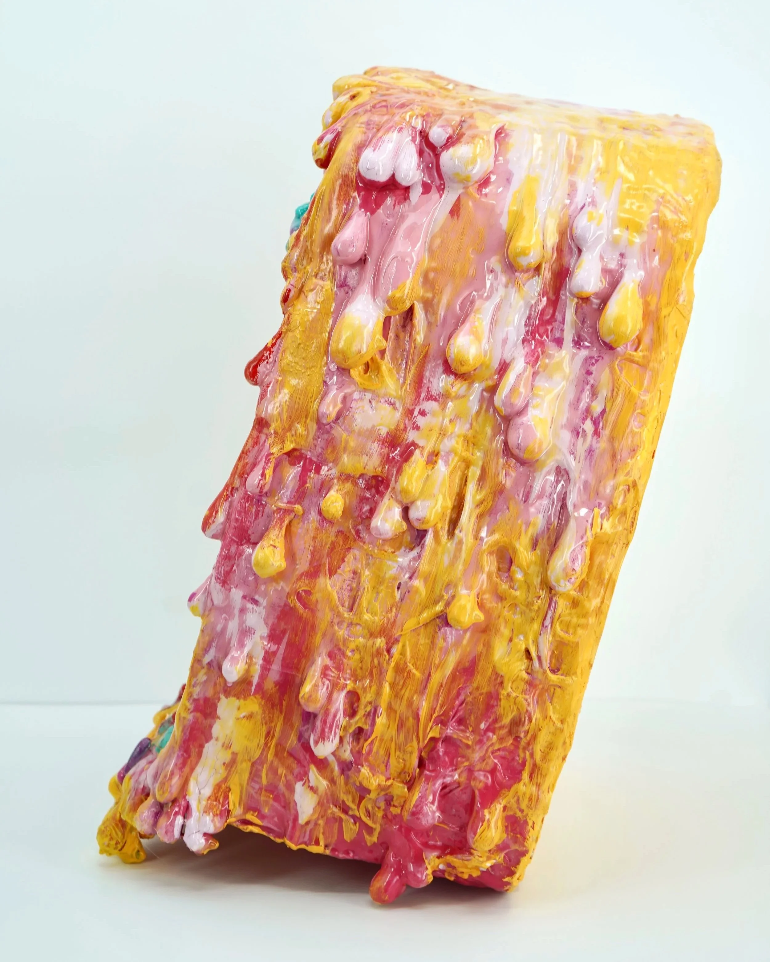 Side view of melting medicine cabinet sculpture by contemporary artist Sophia Huang, mixed media sculpture with resin, paint, and embedded pill capsules