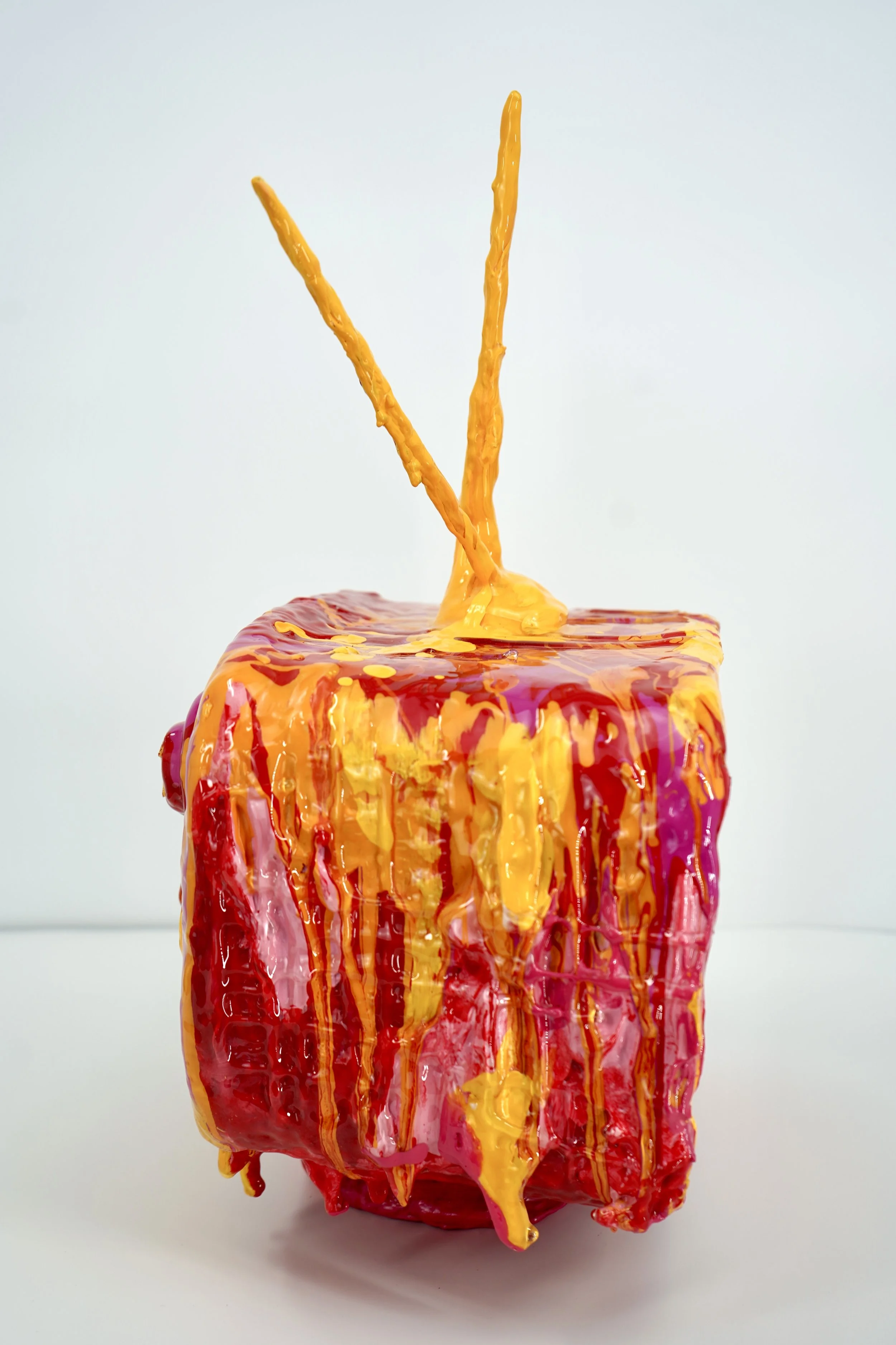 Side view of melting television sculpture by contemporary artist Sophia Huang, mixed media sculpture with resin, paint, and embedded lenticular print, abstract TV form
