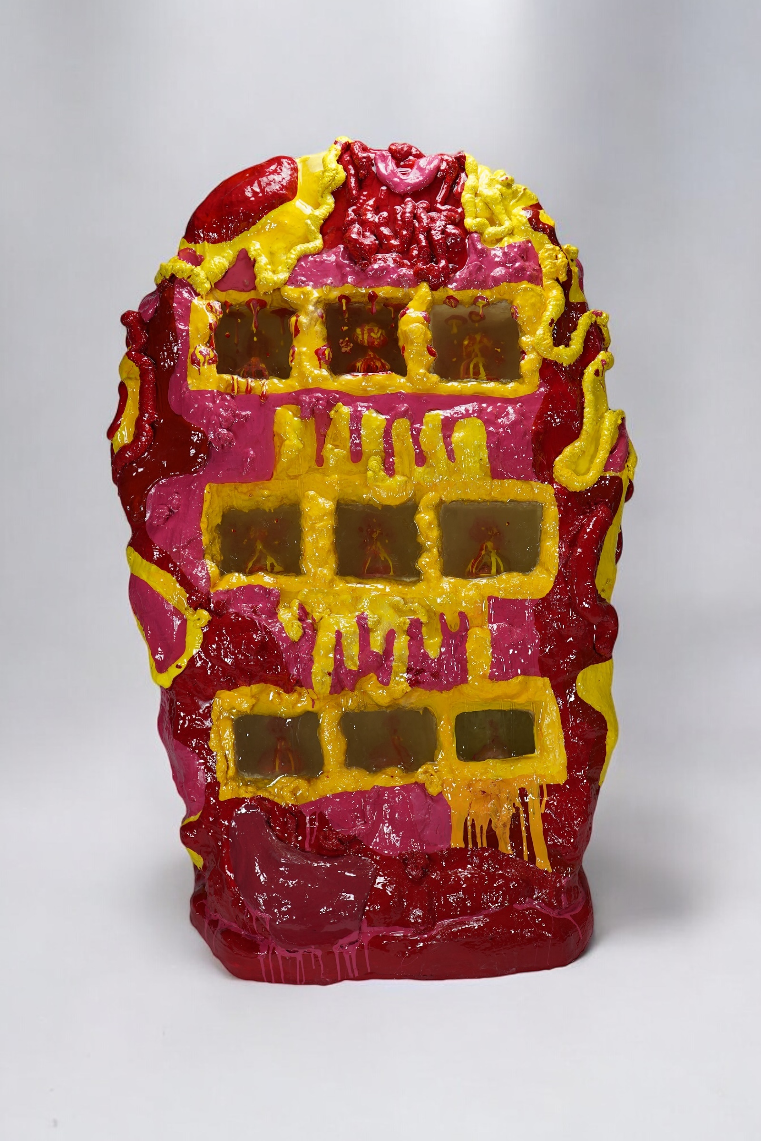 Front view of Volcanic Shelf sculpture by contemporary artist Sophia Huang, mixed media shelf sculpture with resin, paint, and embedded objects, abstract melting form