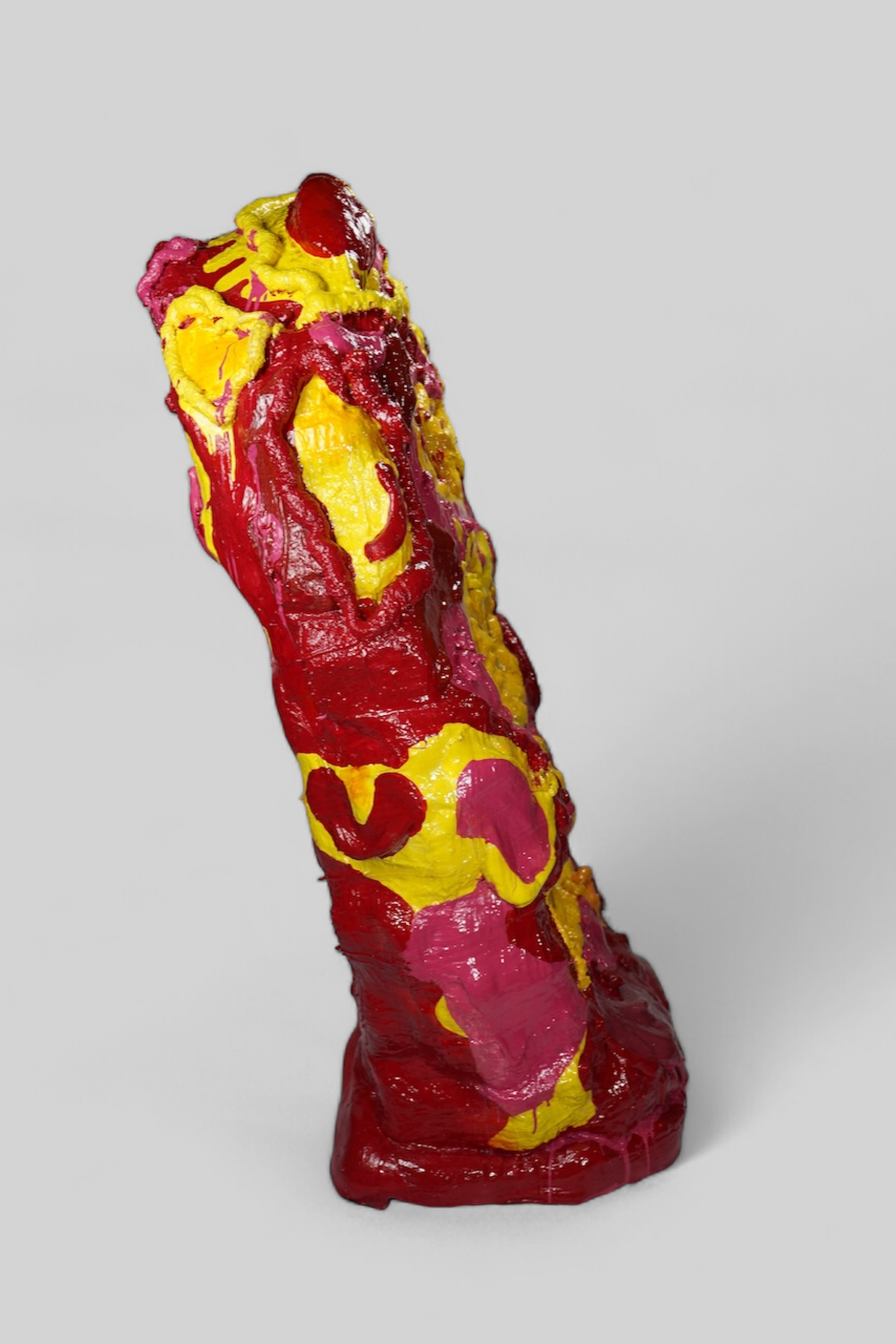 Side view of Volcanic Shelf sculpture by contemporary artist Sophia Huang, mixed media shelf sculpture with resin, paint, and embedded objects, abstract melting form