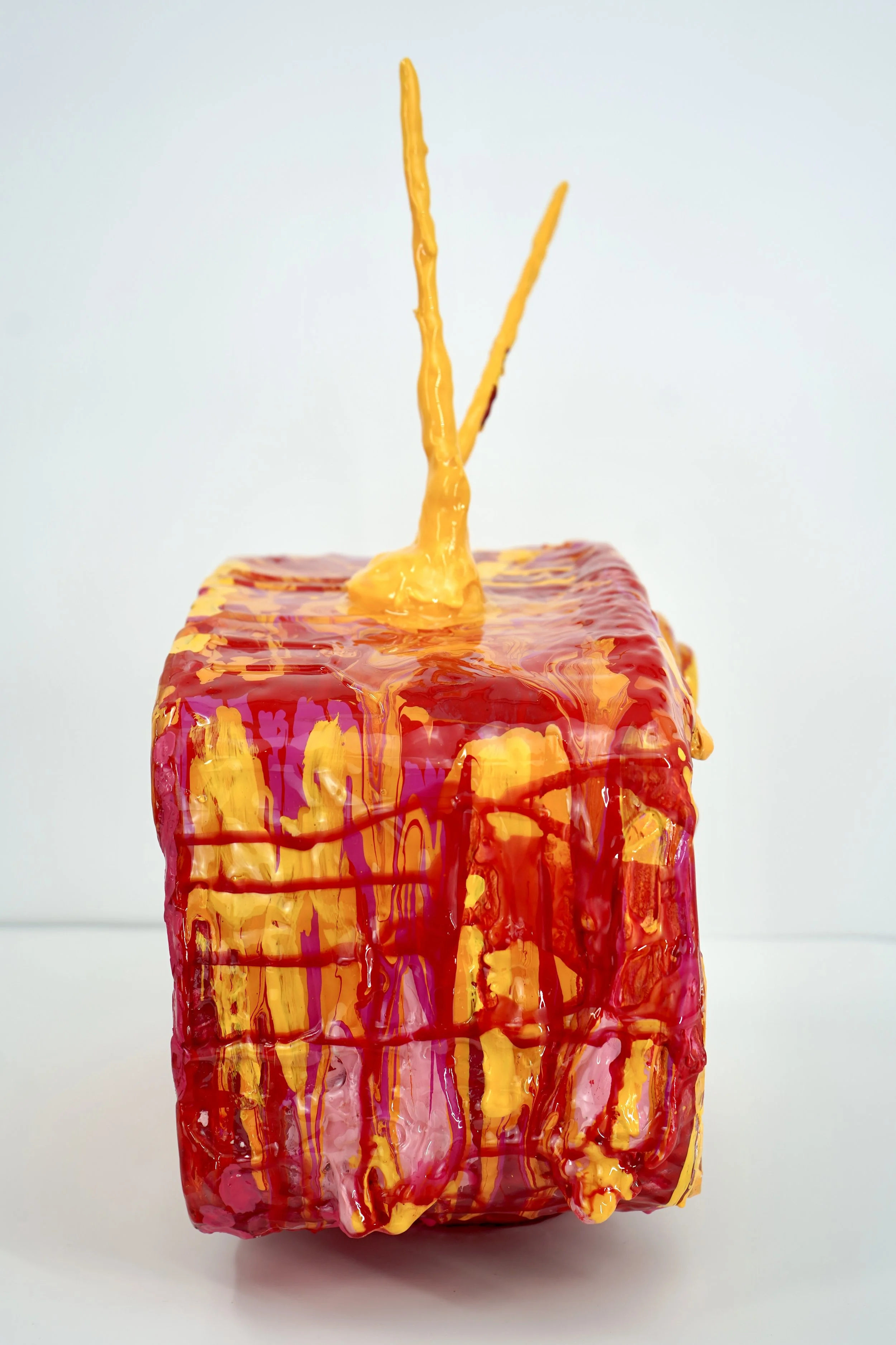 Side view of melting television sculpture by contemporary artist Sophia Huang, mixed media sculpture with resin, paint, and embedded lenticular print, abstract TV form