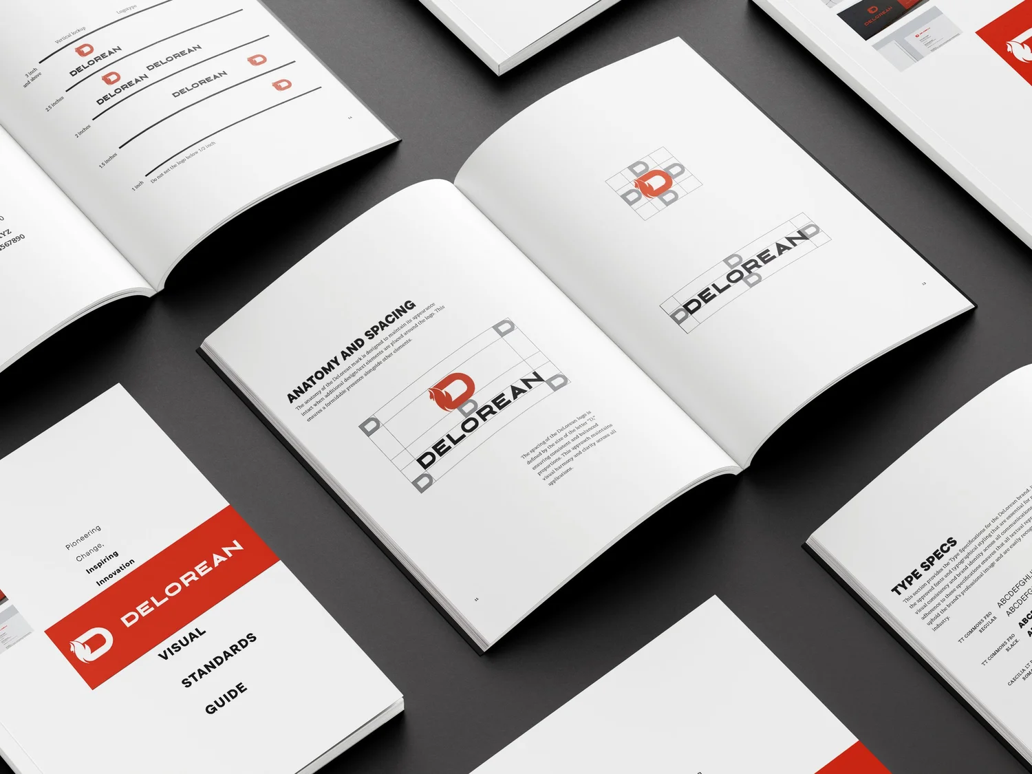 DeLorean concept brand guidelines displayed as a series of printed books