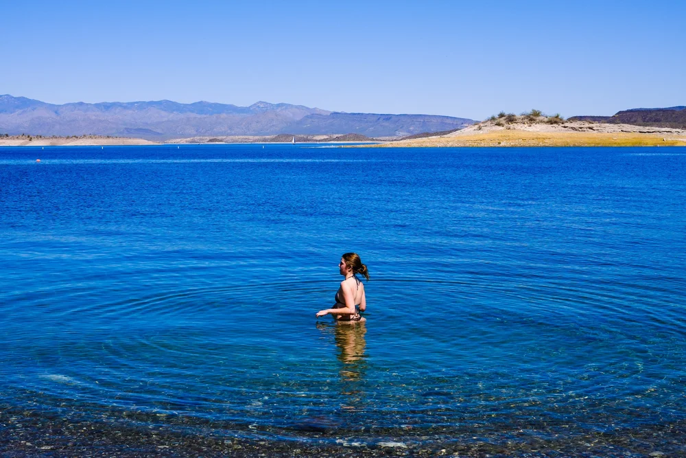  Someone swims in Lake Pleasant, March 20 2025. 