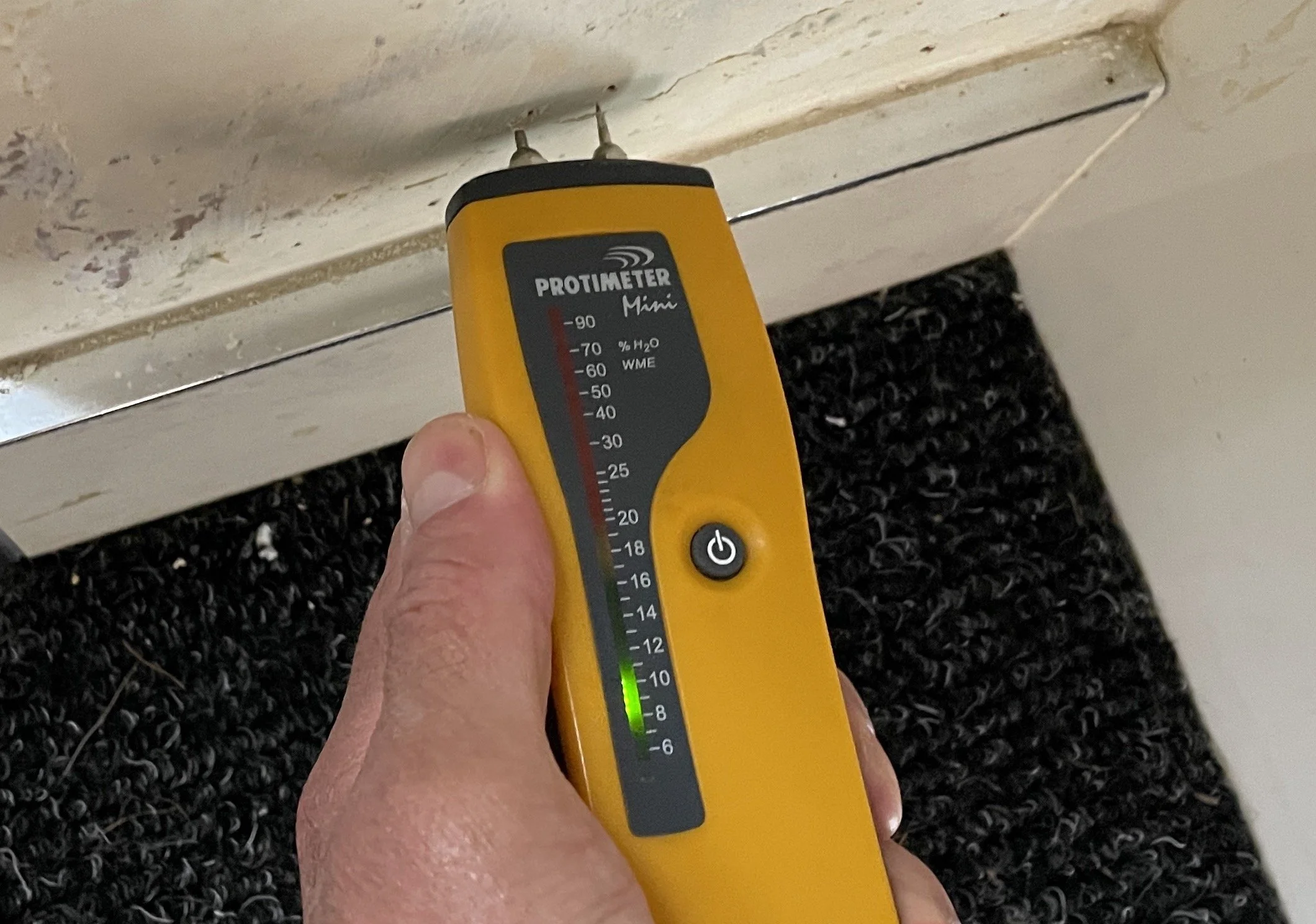 Protimeter Mini moisture measurement confirming low substrate moisture – Durndell Building Surveyors evidence-based damp investigation, Milton Keynes
