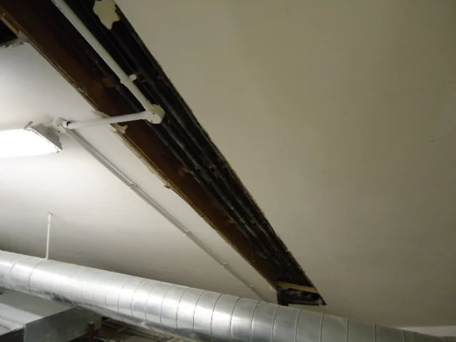 Roof void survey of water damage caused by pipework faults.