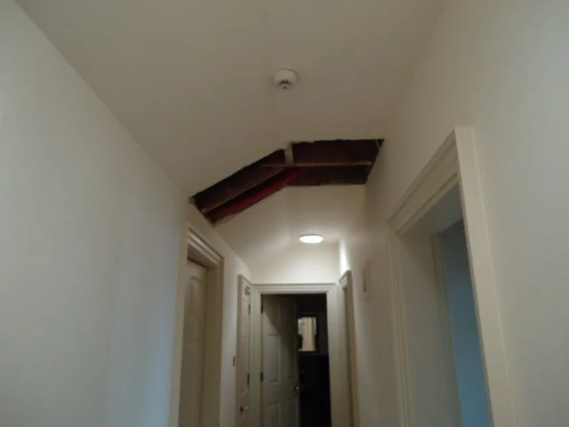 Part ceiling removal to inspect failed pipework.