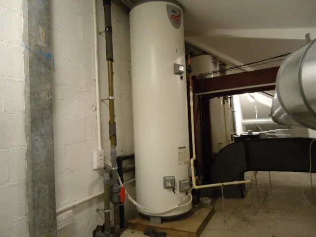 Main pipework and water storage tanks for inspection of leaks and damp.