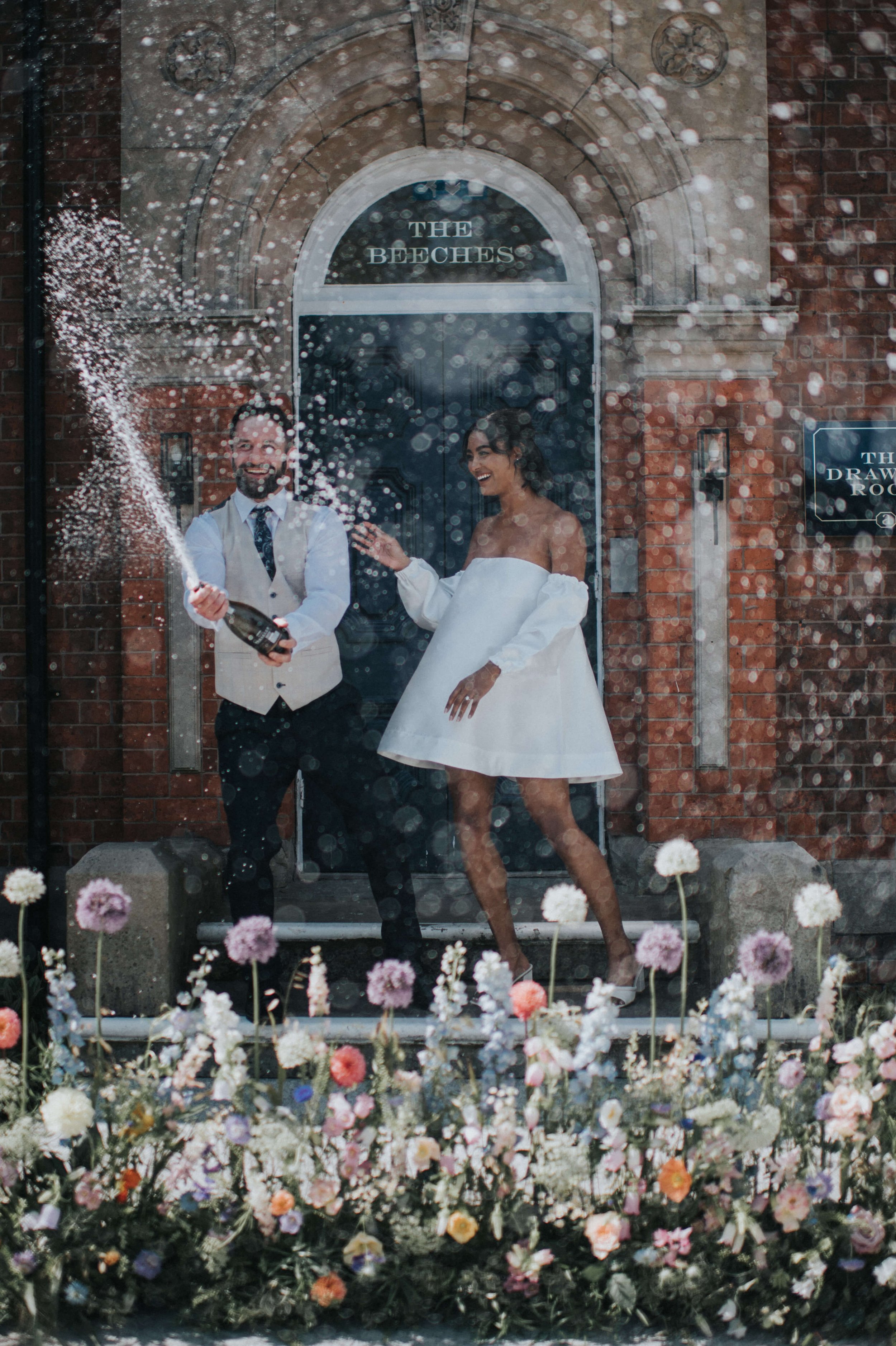 Alberts-Standish-Wedding-Colourful-Flowers-Champagne-Spray3.jpg