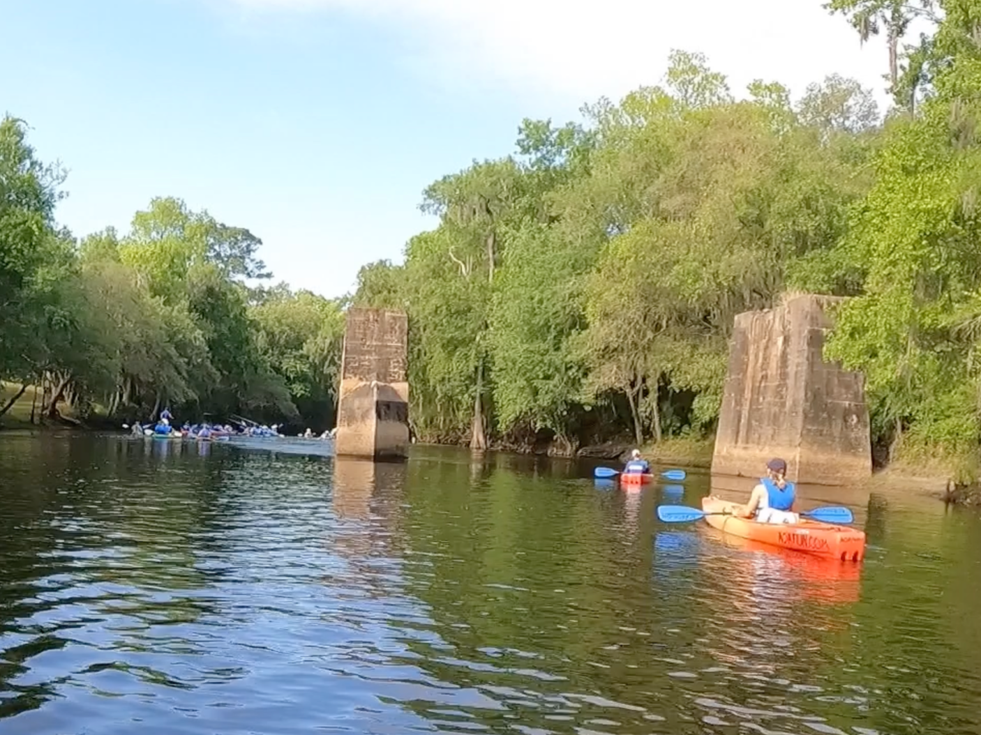 Group of kayakers paddling near 27 Bridge