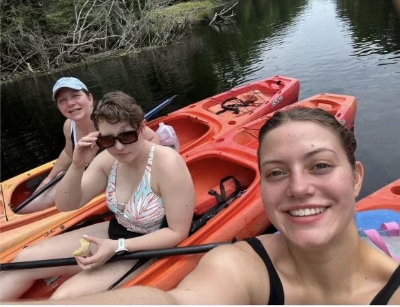 3 women paddling kayaks on the 8 Springs in 8 Miles®