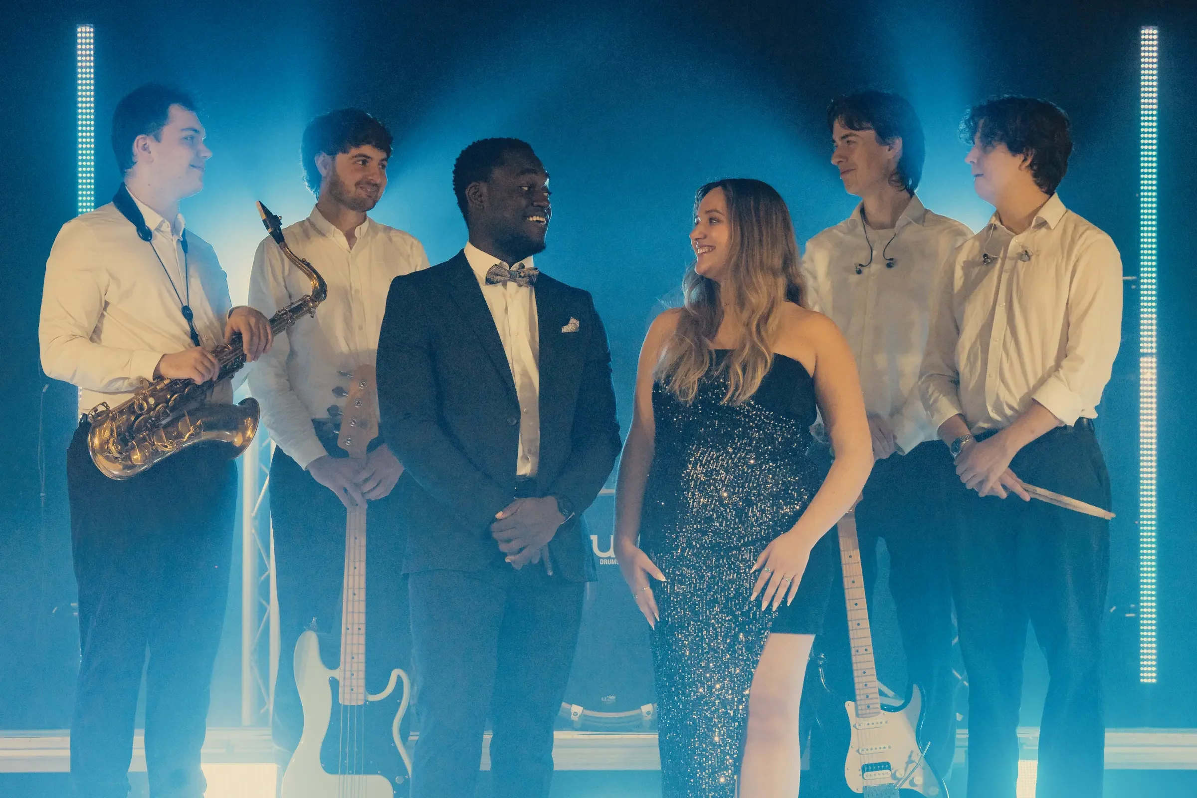 Platinum Vibe band stood together in a group photo