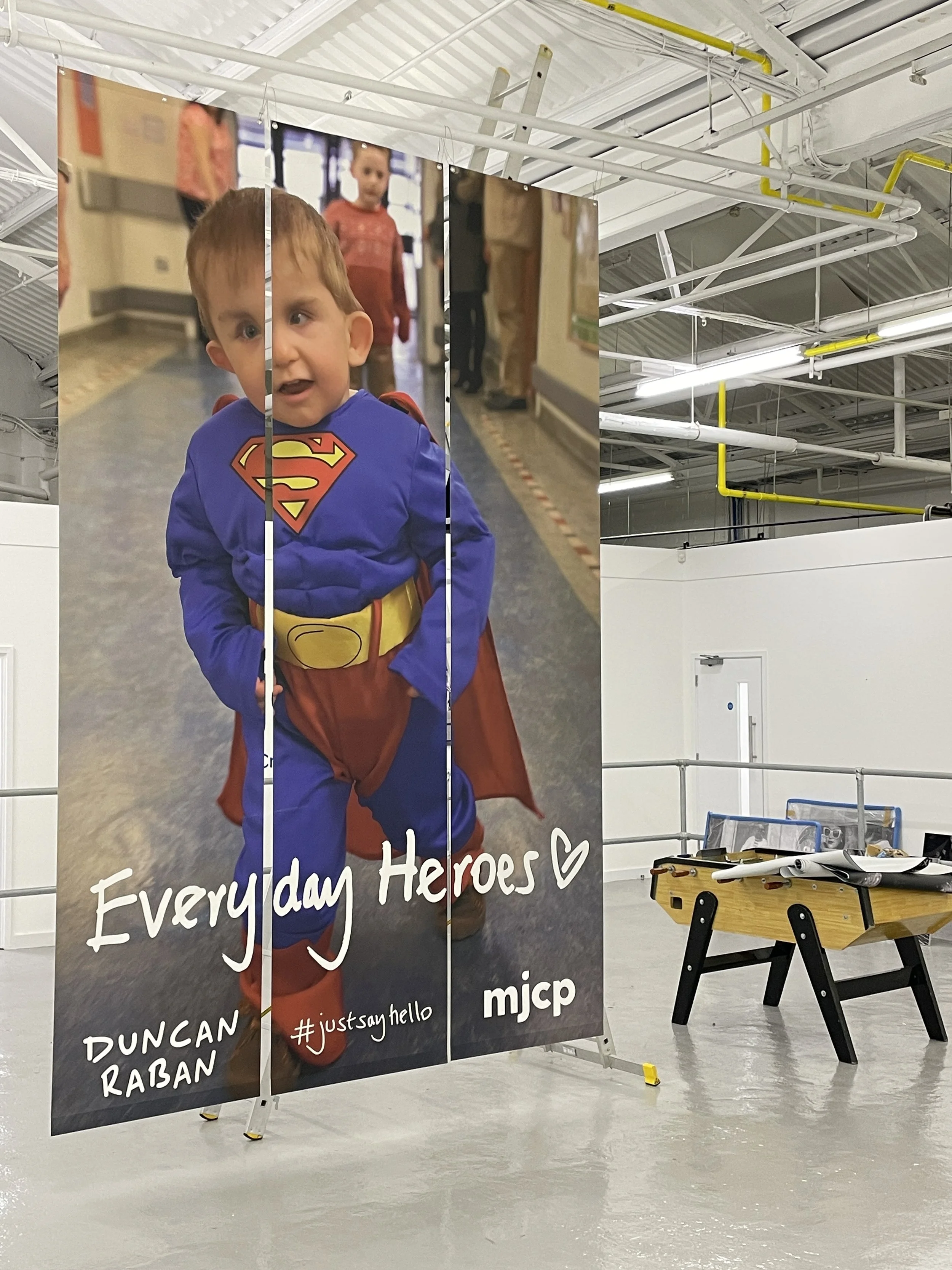 Everyday Heroes By Duncan Raban Large Hanging Banners - 1.JPG