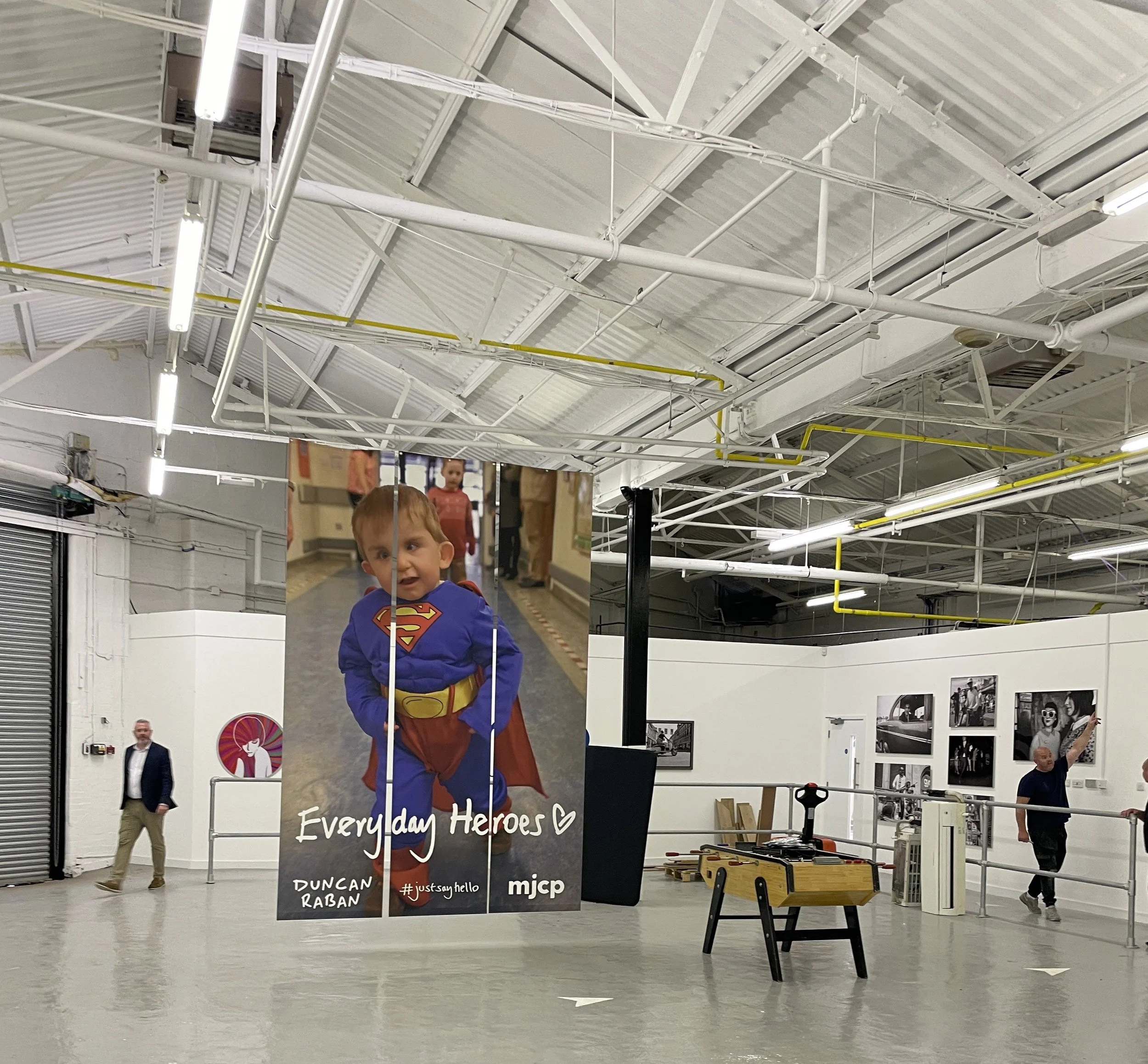 Everyday Heroes By Duncan Raban Large Hanging Banners - 2.JPG