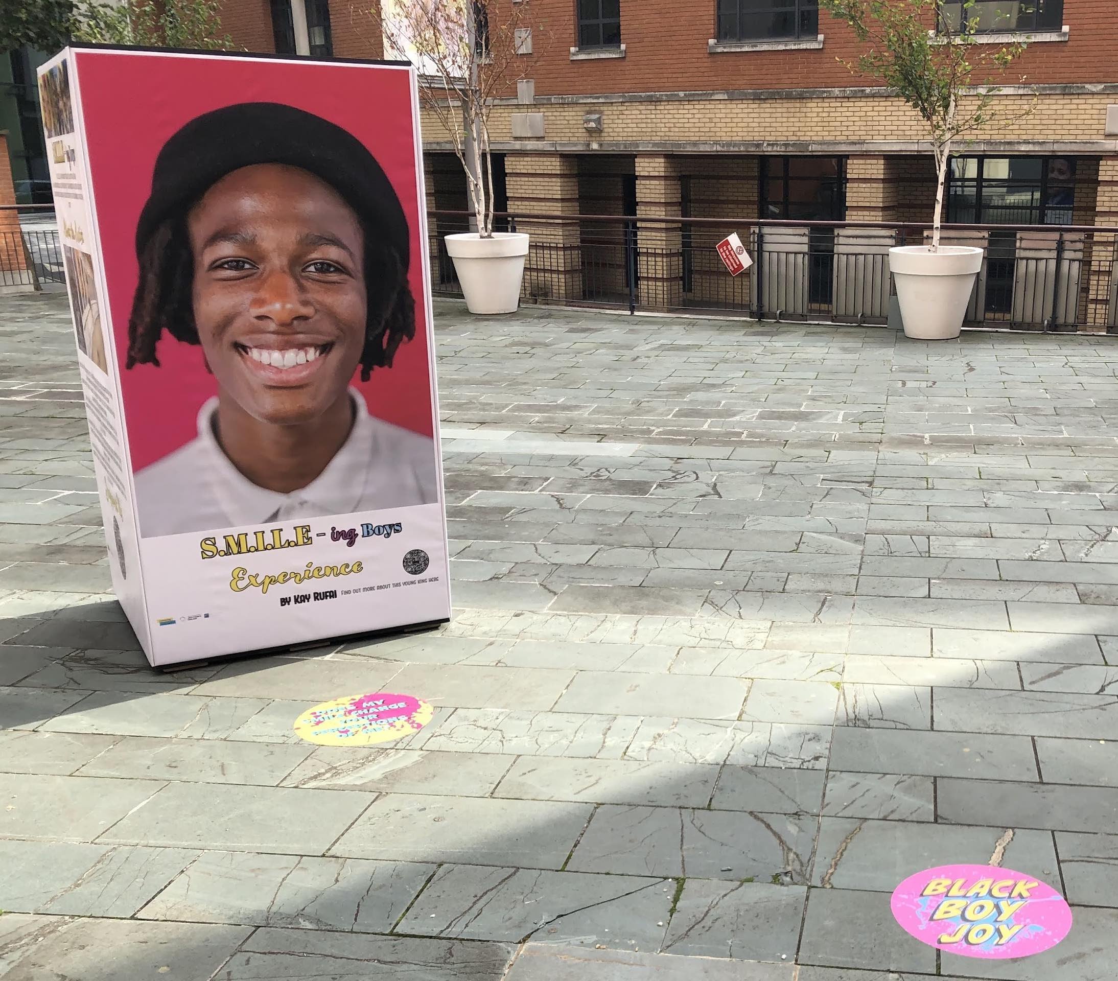 S.M.I.L.E-ing Boys Black Boy Joy Graphics and Display Stands.jpg